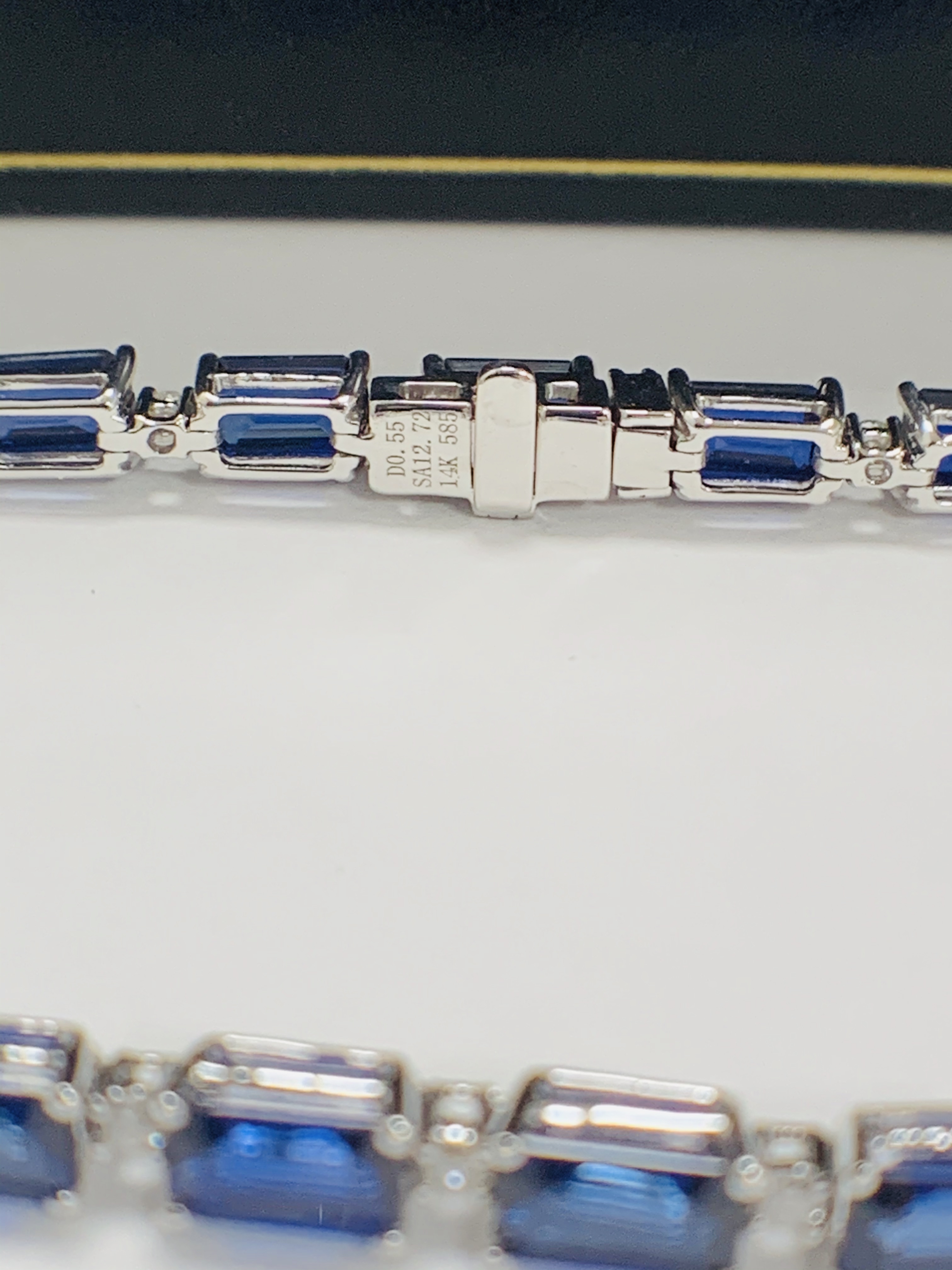 14ct Sapphire and Diamond tennis bracelet featuring, 20 oval cut, blue Sapphires (12.72ct TSW), claw - Image 3 of 16