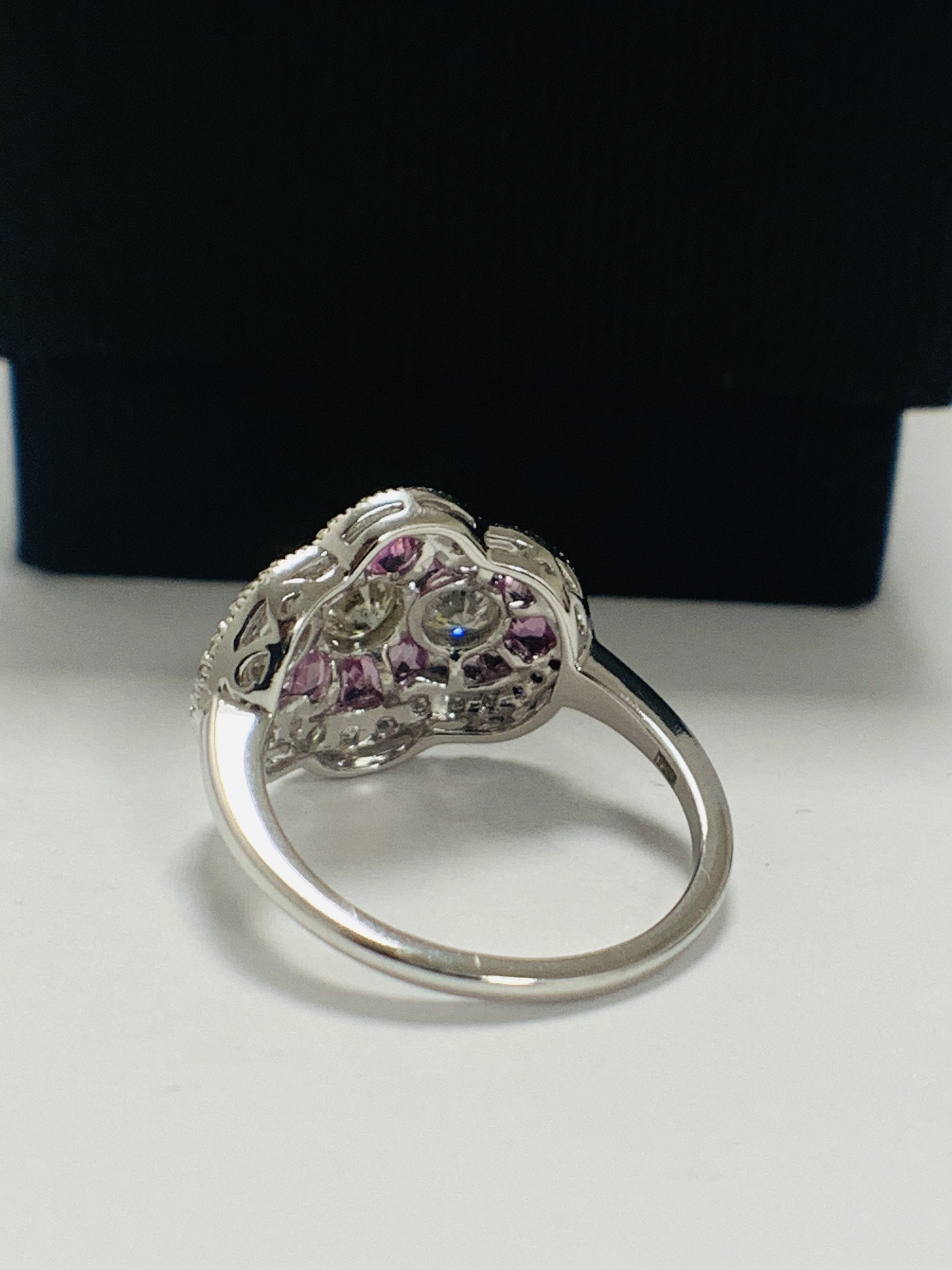 18ct White Gold Sapphire and Diamond ring featuring centre, 3 round brilliant cut Diamonds (0.50ct), - Image 5 of 11