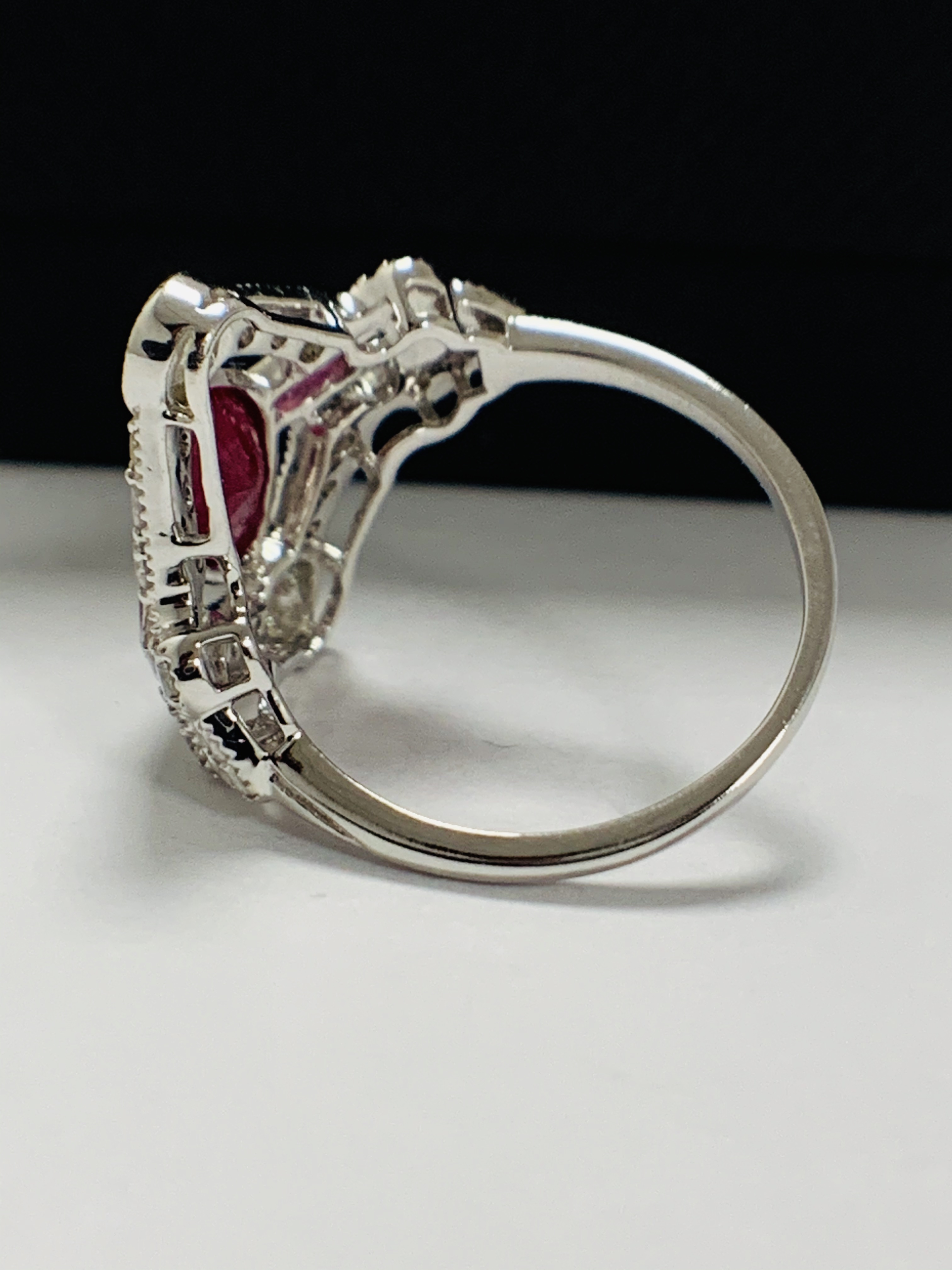 18ct White Gold Ruby and Diamond ring featuring centre, marquise cut, Natural Ruby (1.34ct), claaw s - Image 4 of 13