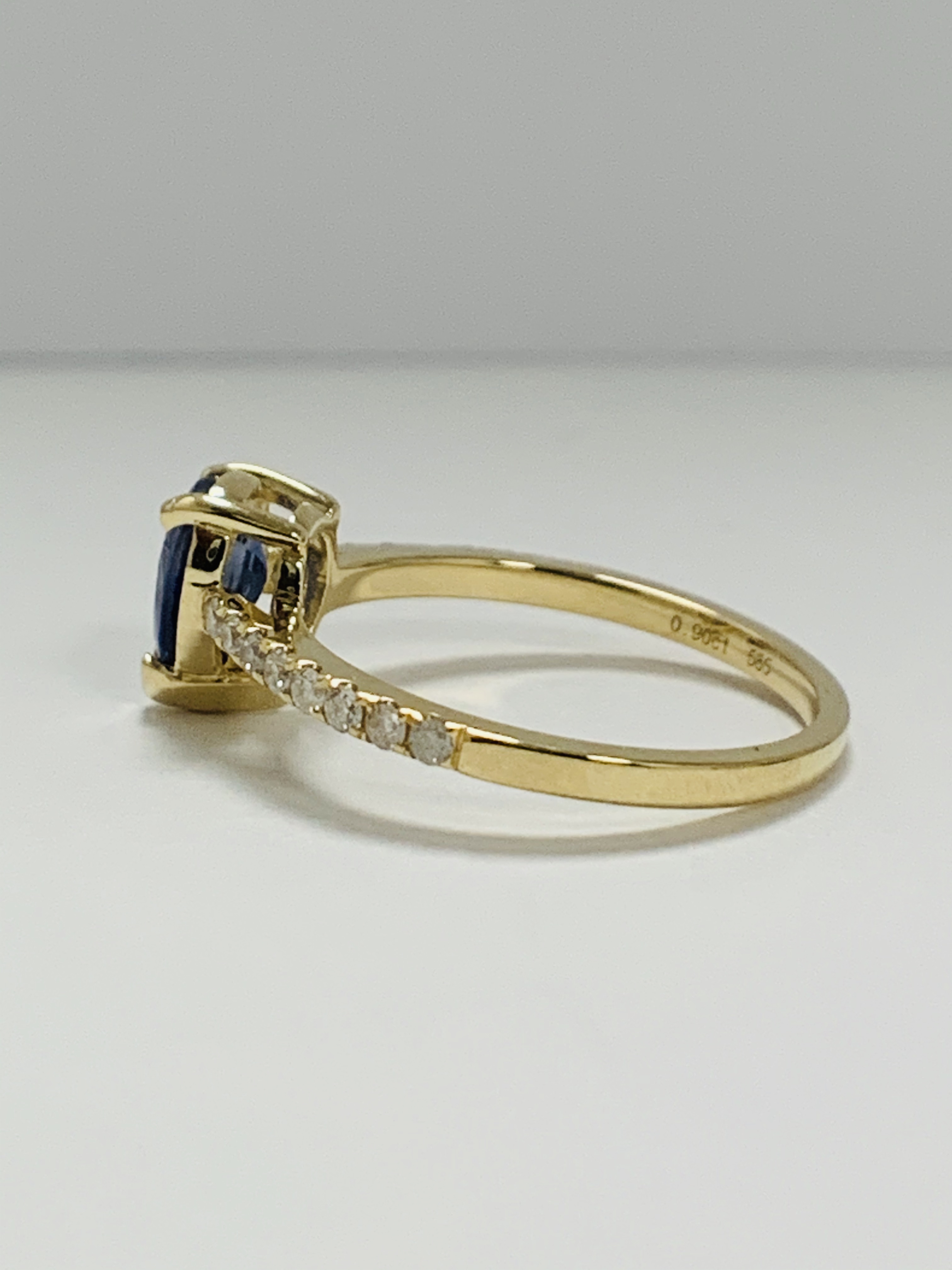 14ct Yellow Gold Sapphire and Diamond ring featuring centre, pear cut, medium blue Sapphire (0.90ct) - Image 3 of 13