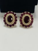 14ct Rose Gold Ruby and Diamond stud earrings featuring, 2 oval cut Rubies (1.47ct TSW), claw set, w