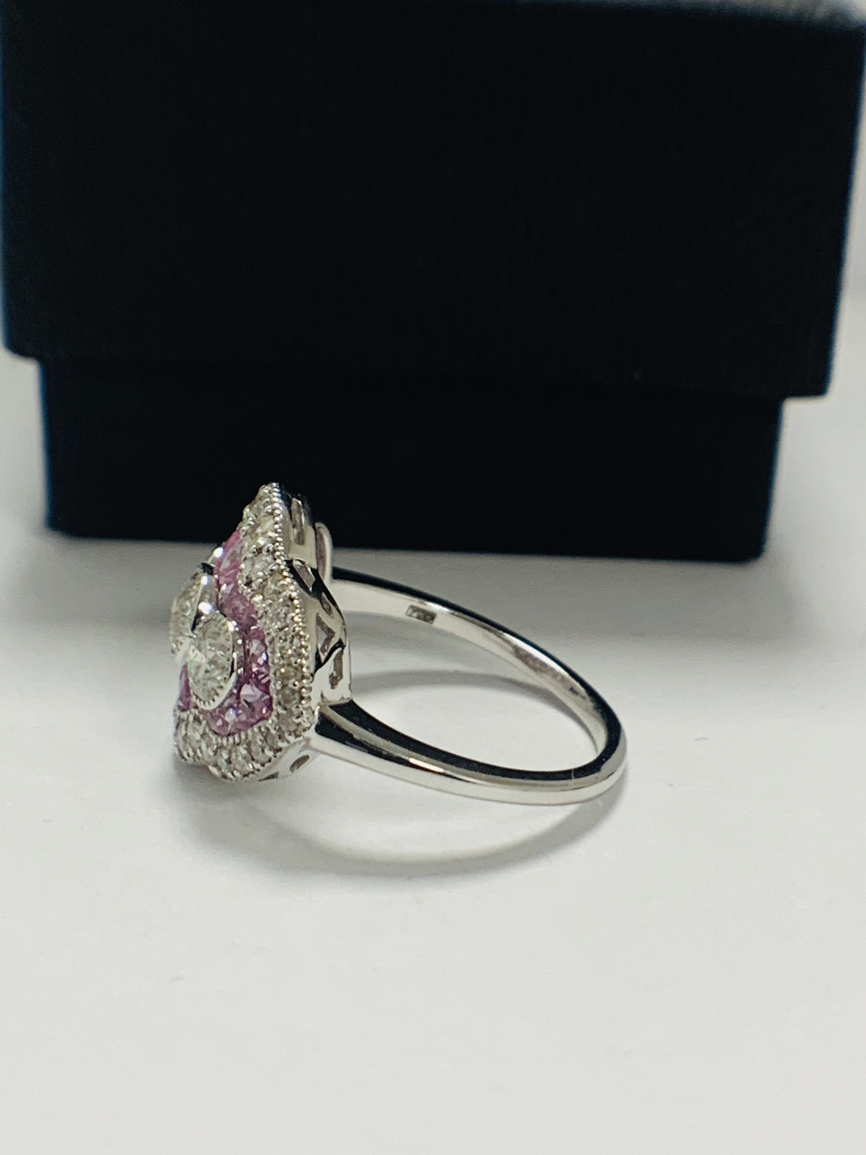 18ct White Gold Sapphire and Diamond ring featuring centre, 3 round brilliant cut Diamonds (0.50ct), - Image 3 of 11