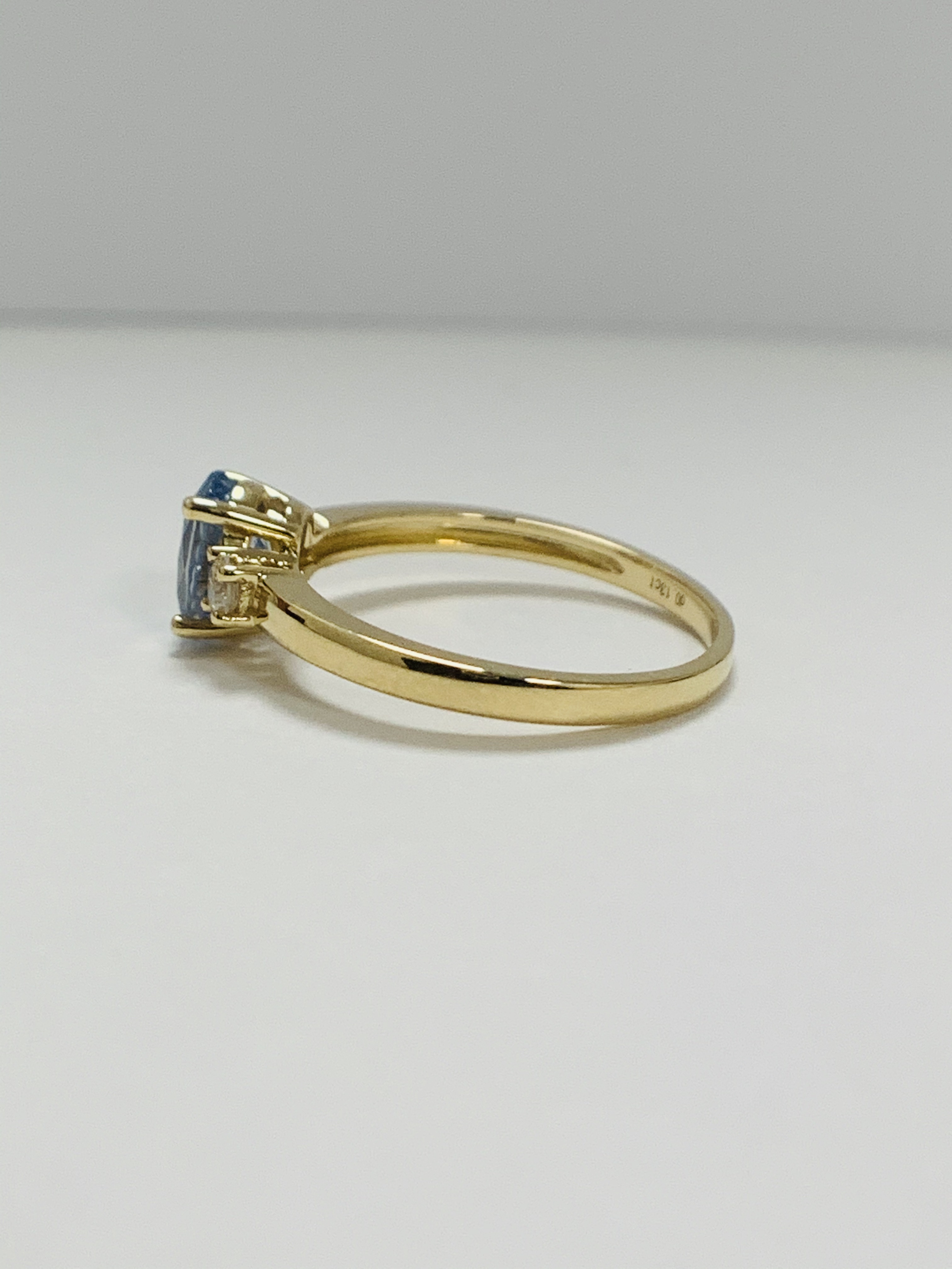 14ct Yellow Gold Sapphire and Diamond ring featuring centre, oval cut, medium blue Sapphire (1.05ct) - Image 3 of 9