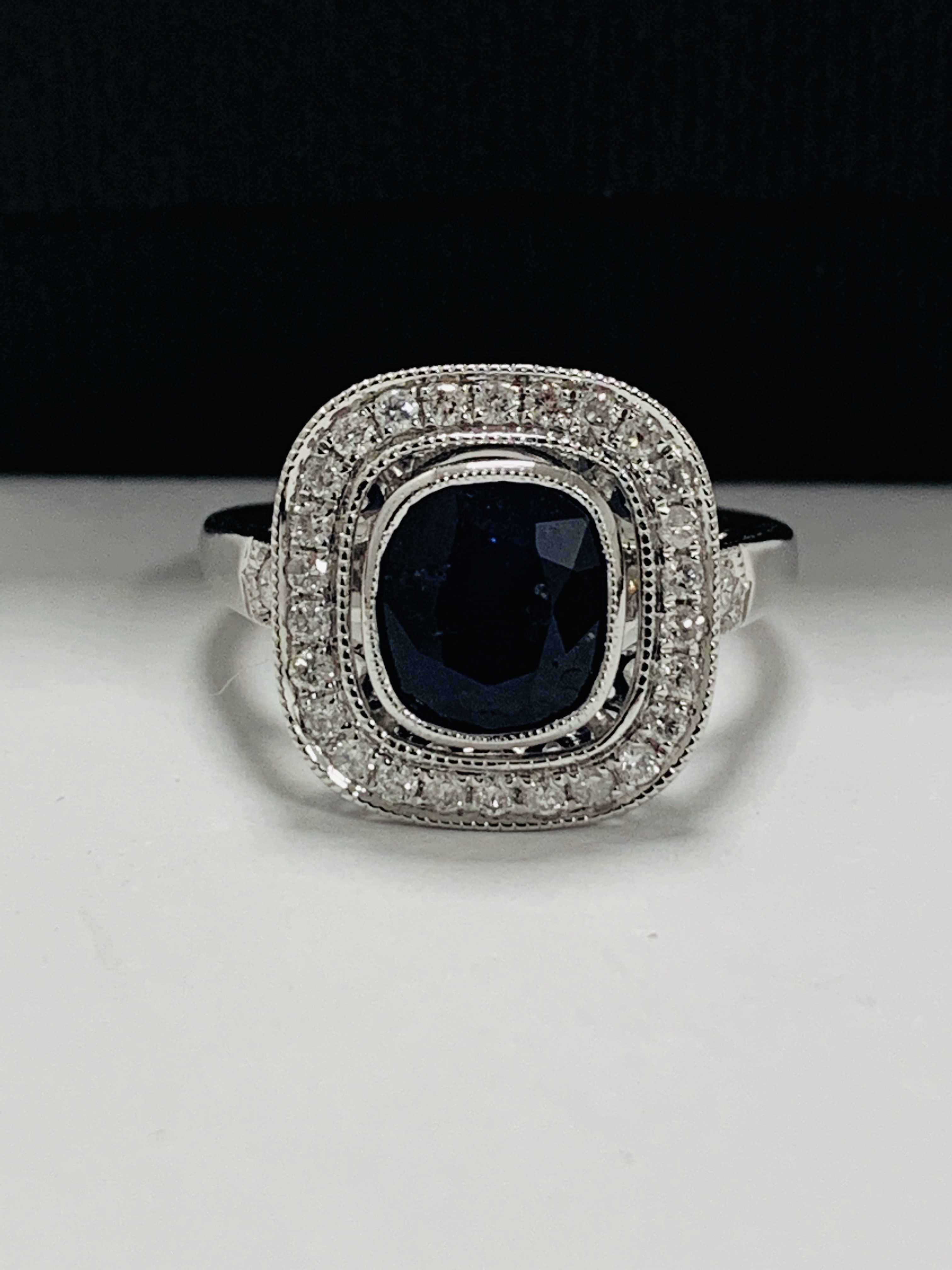18ct White Gold Sapphire and Diamond ring featuring centre, cushion cut, natural Kashmir Sapphire (2