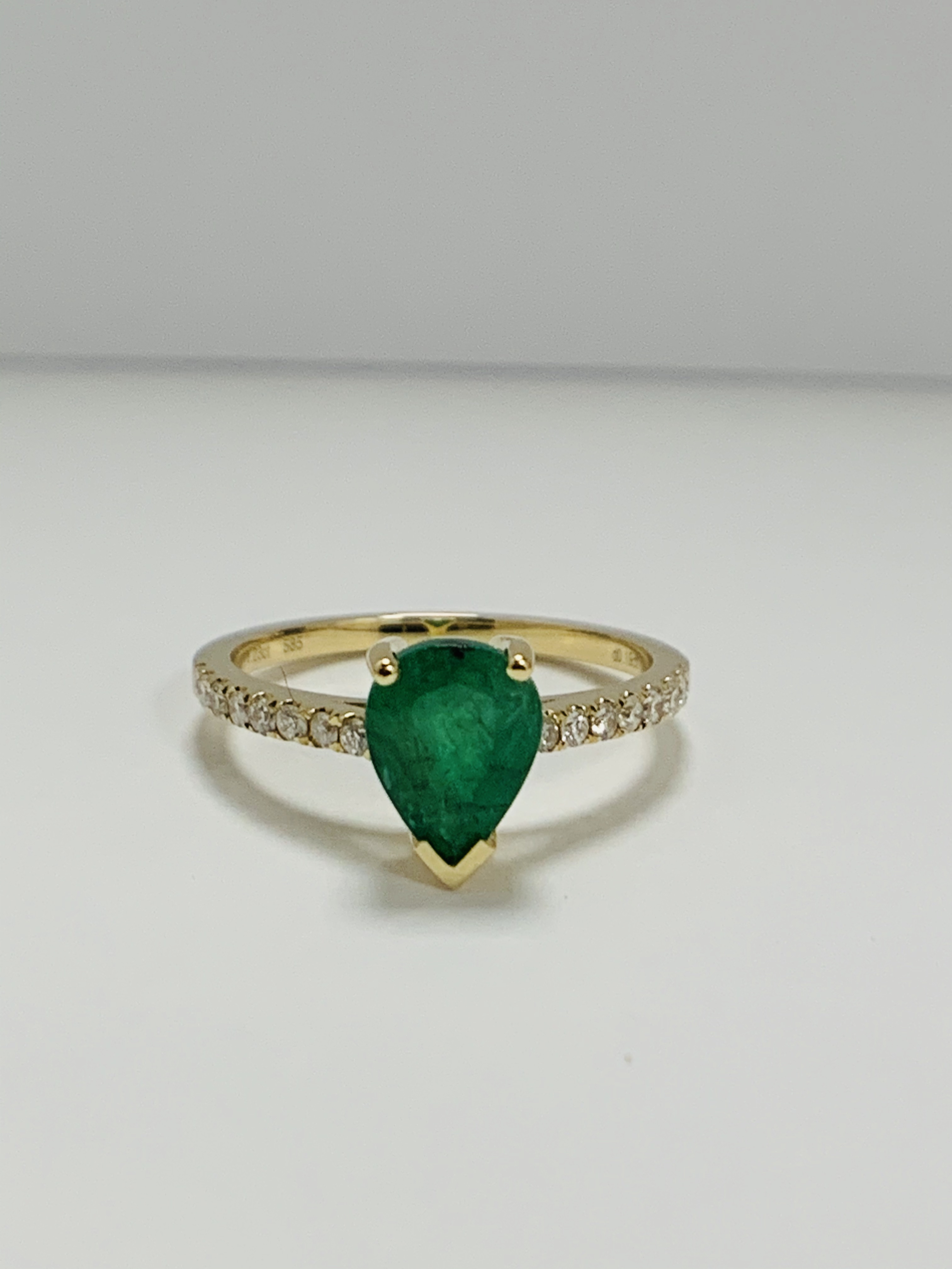14ct Yellow Gold Emerald and Diamond ring featuring centre, pear cut, medium green Emerald (1.23ct), - Image 7 of 10