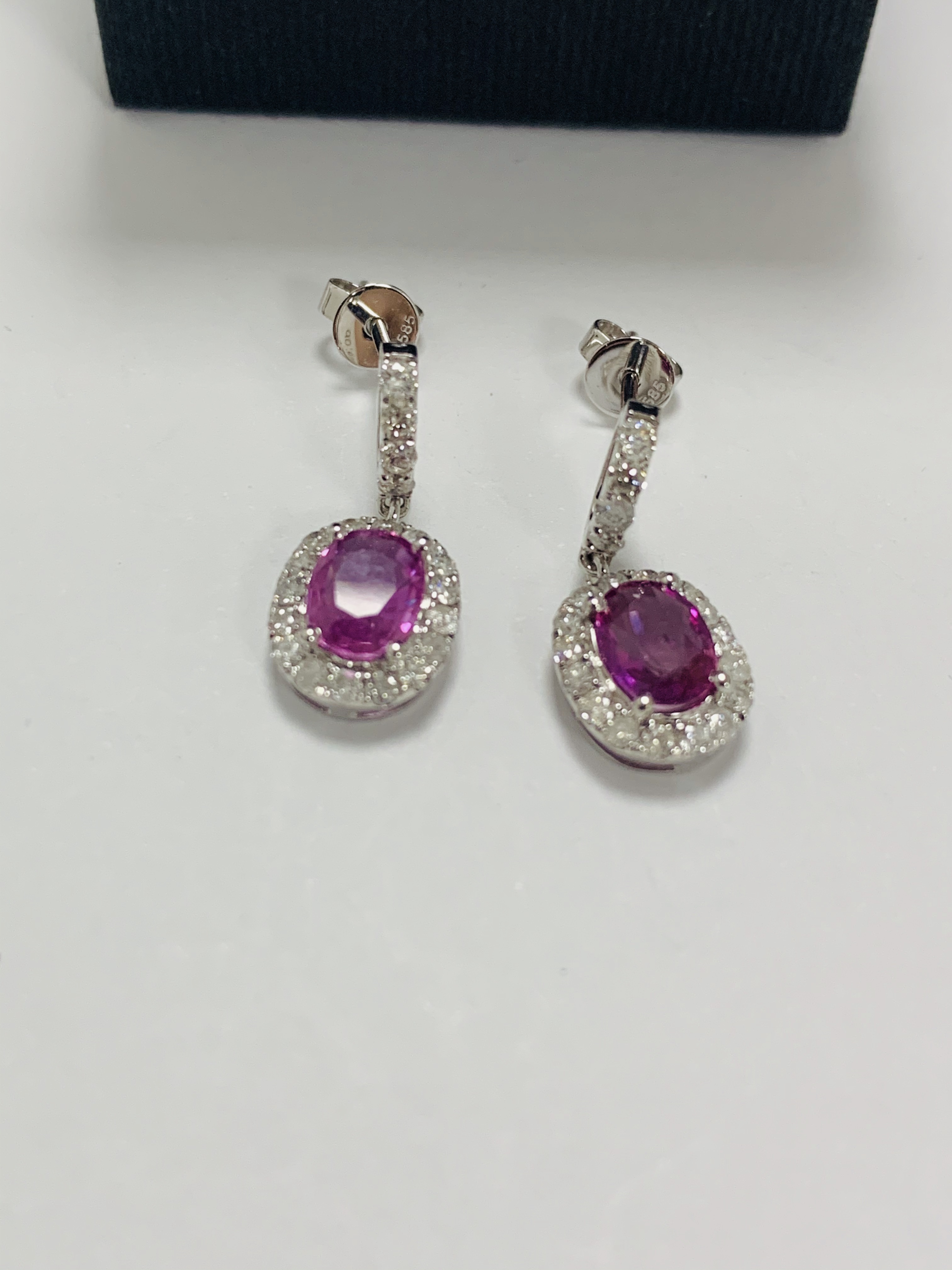 14ct White Gold Sapphire and Diamond drop earrings featuring, 2 oval cut, pink Sapphires (1.66ct TSW - Image 4 of 9