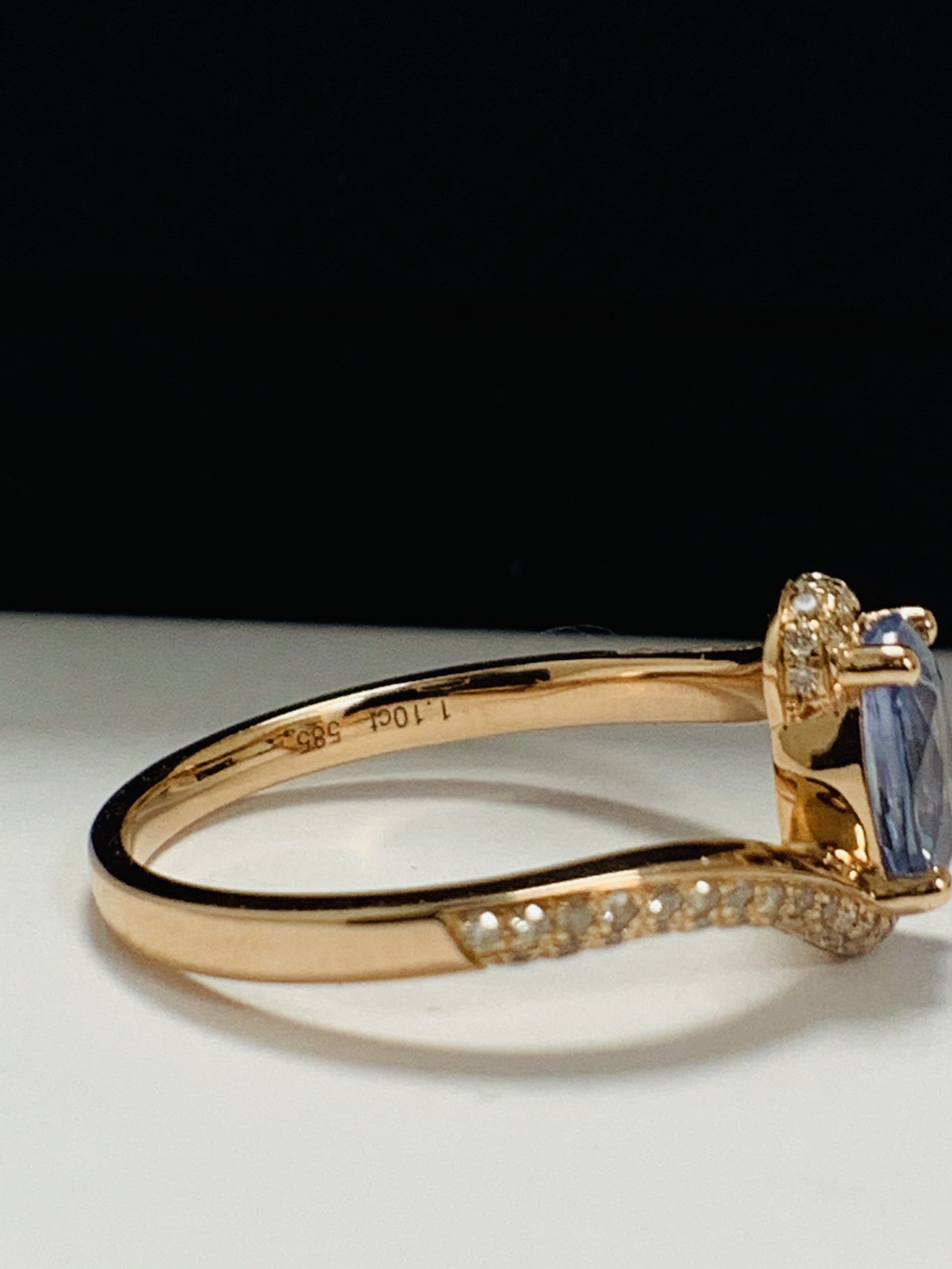 14ct Rose Gold Sapphire and Diamond ring featuring centre, oval cut, blue Sapphire (1.10ct), claw se - Image 7 of 13