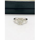 platinum diamond ring featuring