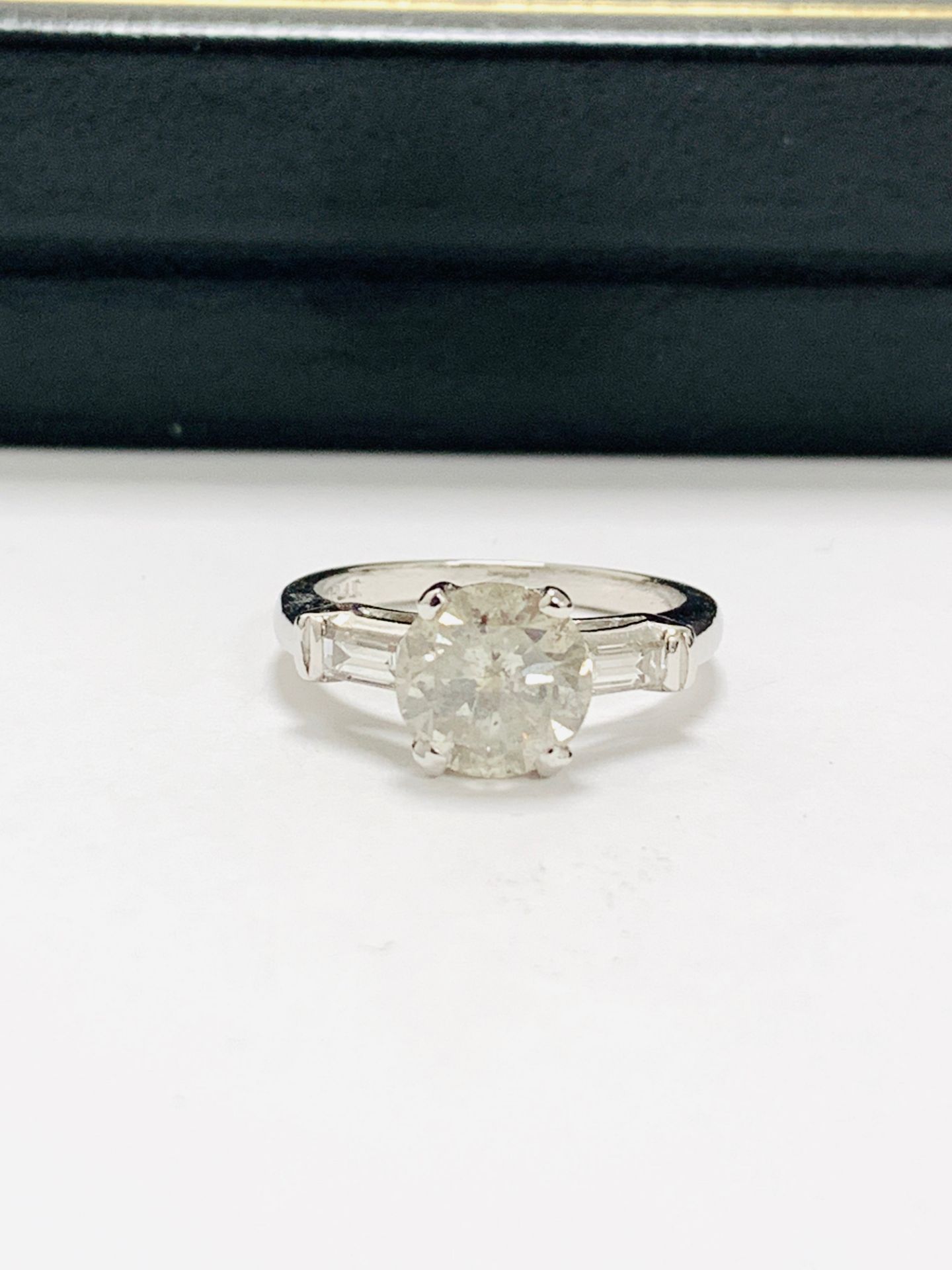 platinum diamond ring featuring