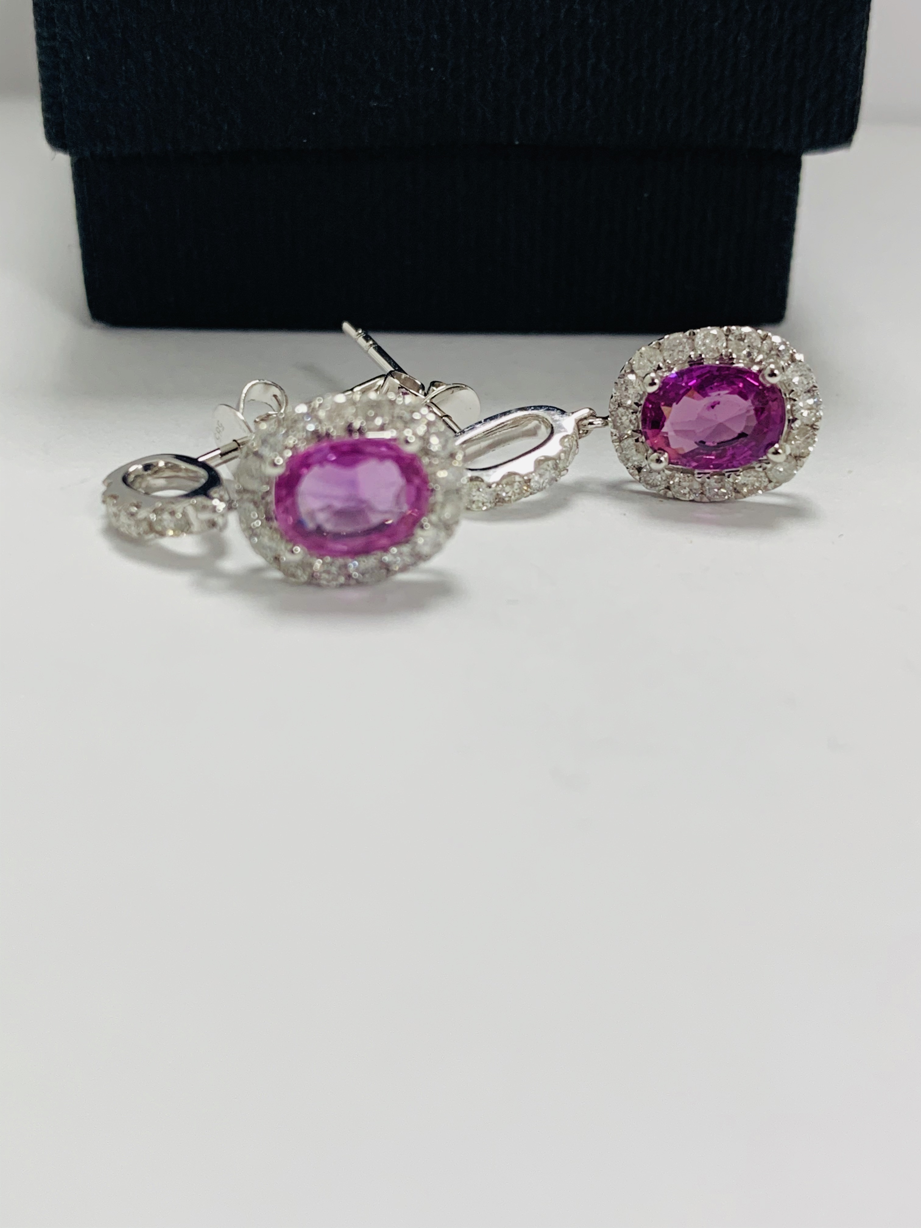 14ct White Gold Sapphire and Diamond drop earrings featuring, 2 oval cut, pink Sapphires (1.66ct TSW