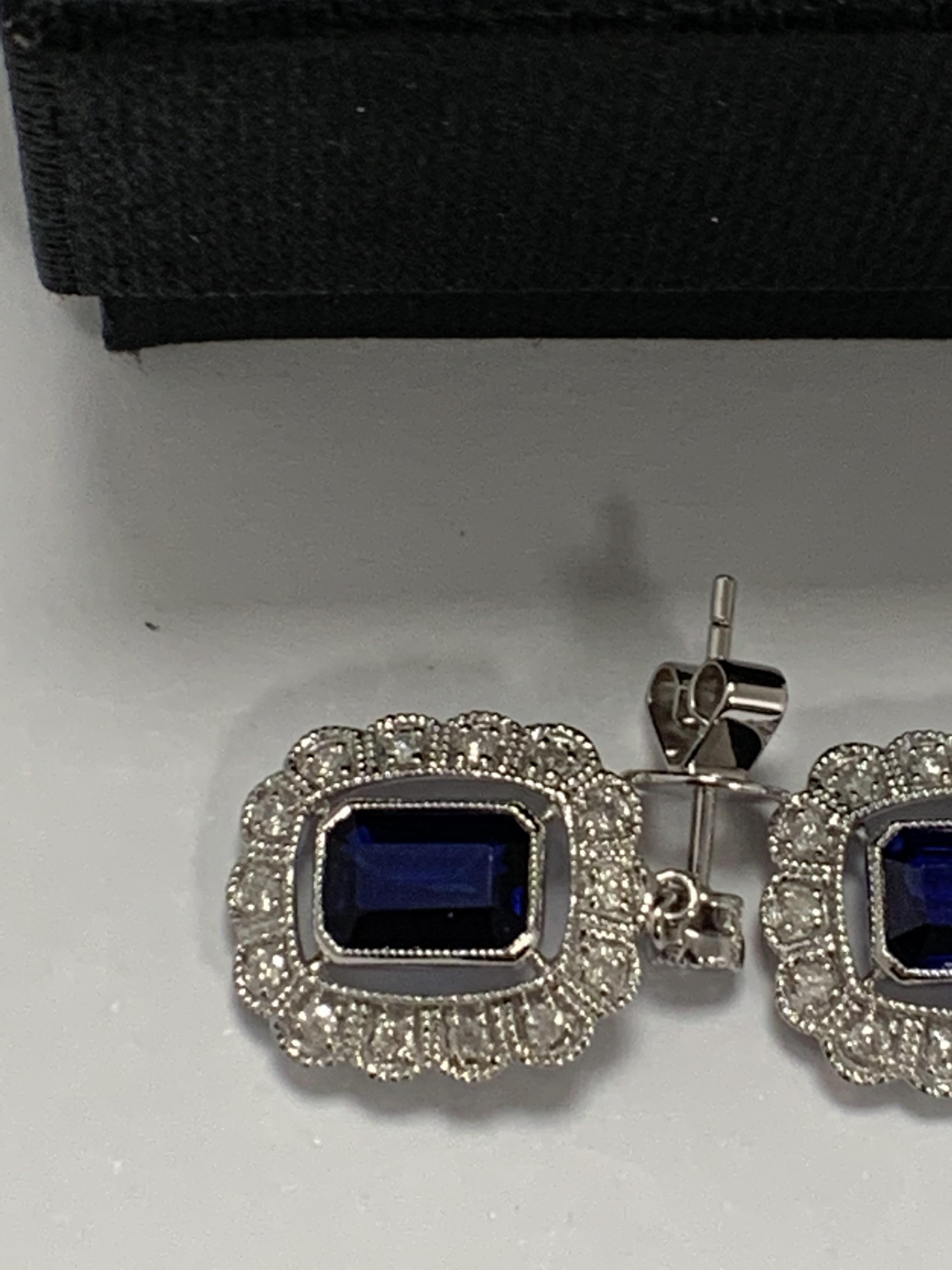 14ct White Gold Sapphire and Diamond earrings featuring, 2 cushion cut, blue Sapphires (2.24ct TSW), - Image 3 of 13