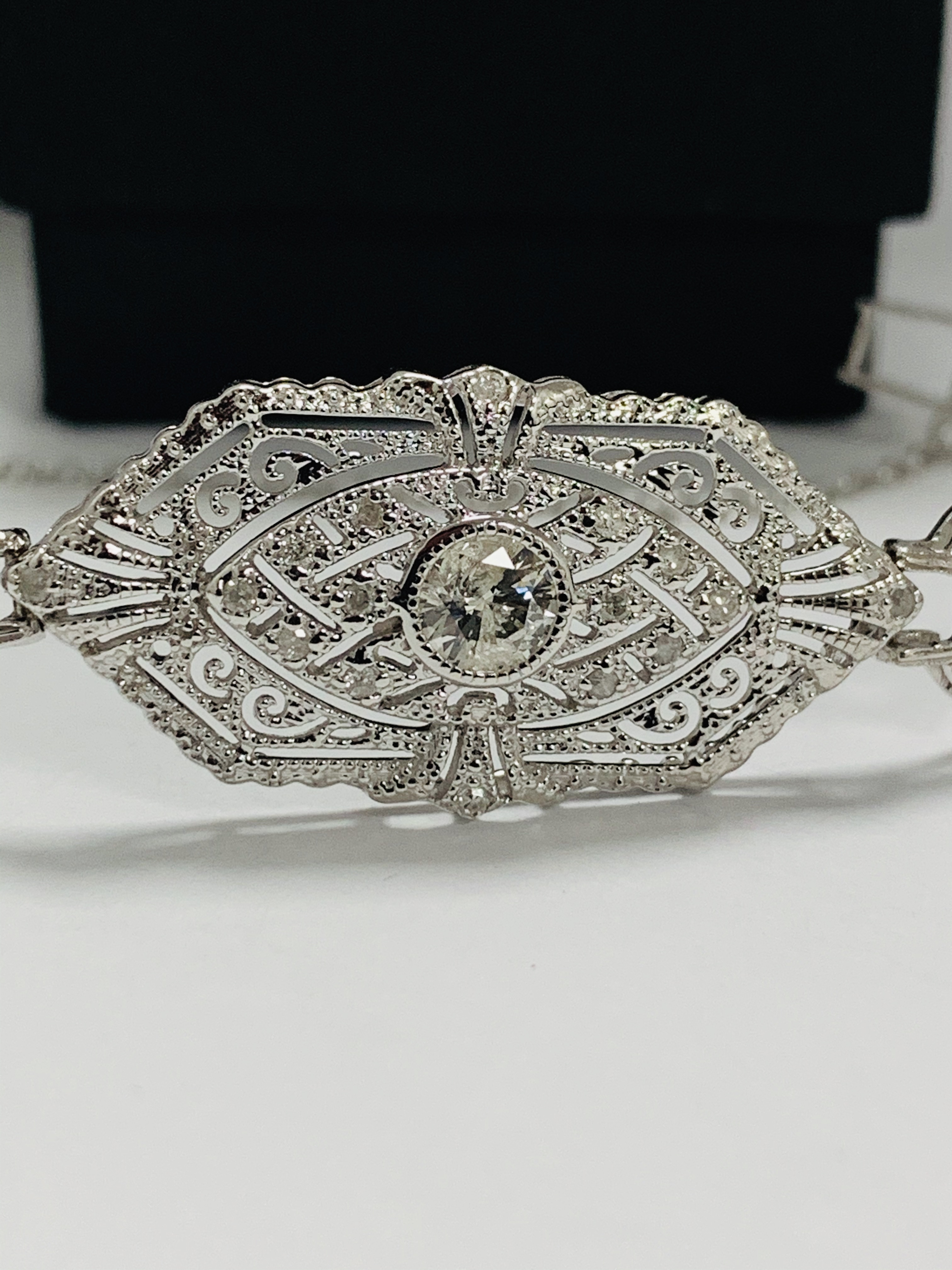 Platinum Diamond bracelet featuring, one round brilliant cut Diamond (0.43ct), with 49 round brillia - Image 11 of 16