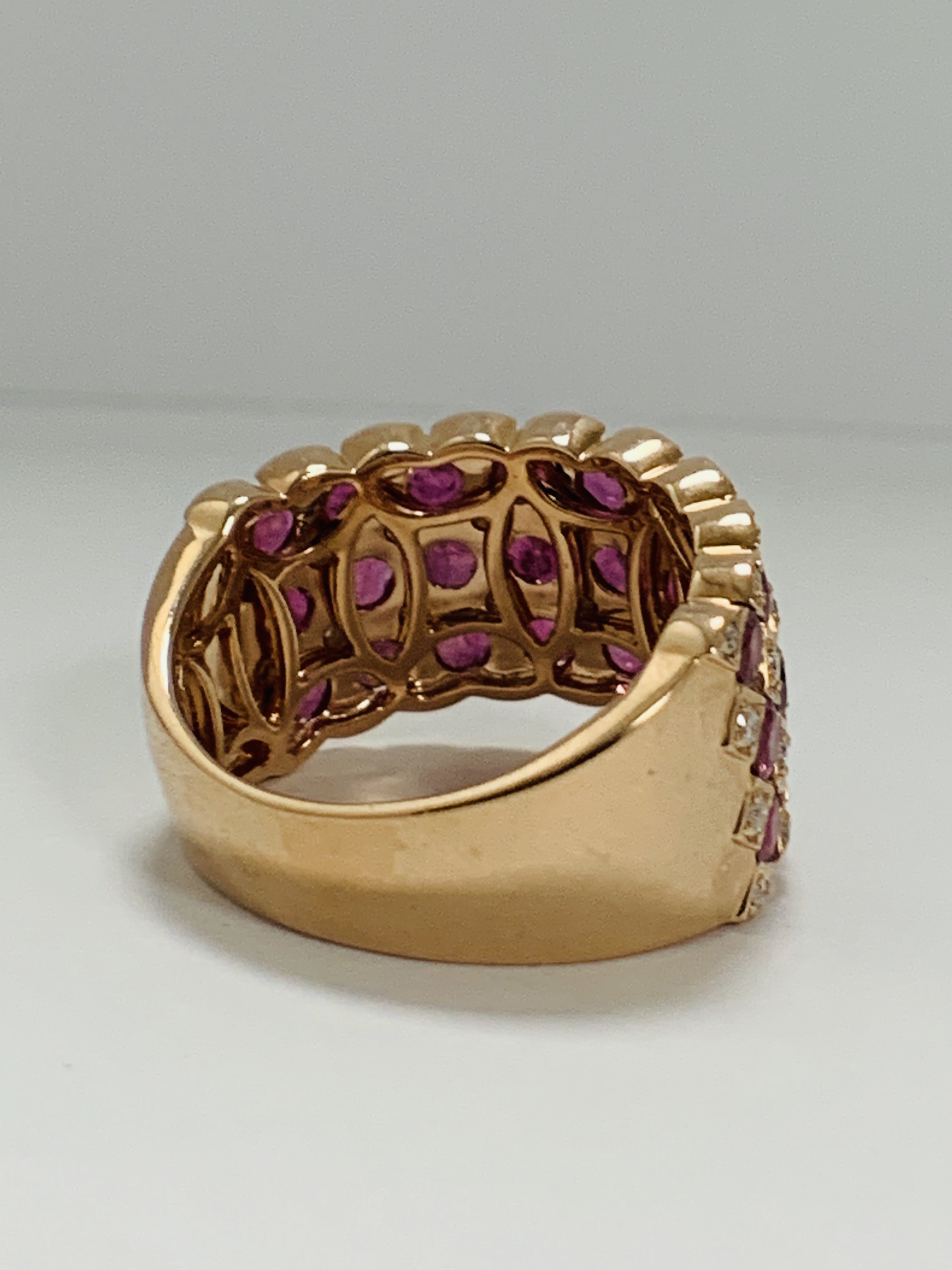 14ct Rose Gold Ruby and Diamond ring featuring, 27 round cut, medium pinkish red (2.81ct TSW), chann - Image 5 of 13