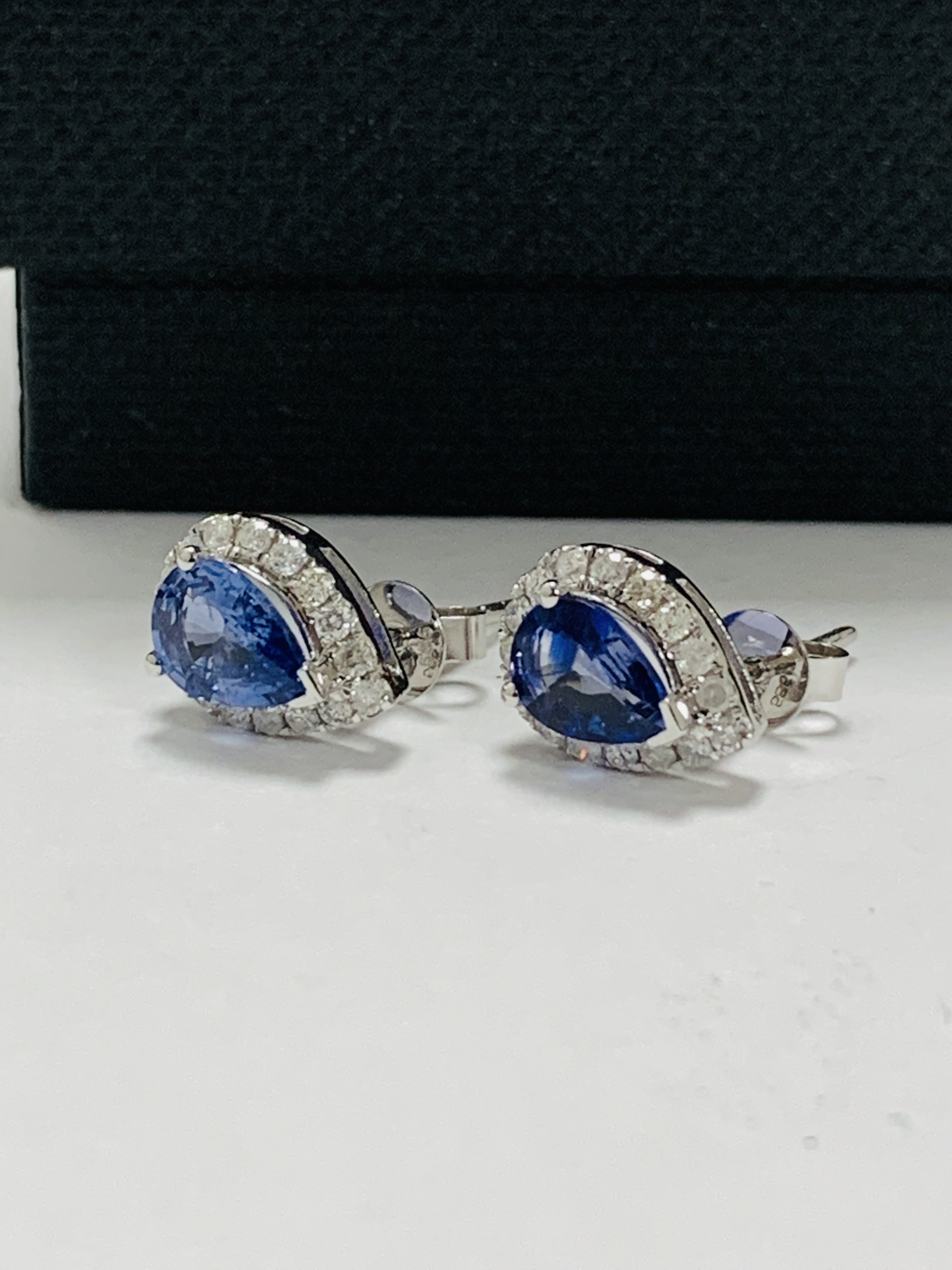 14ct White Gold Sapphire and Diamond earrings featuring centre, 2 pear cut, medium blue Sapphire (1. - Image 2 of 12