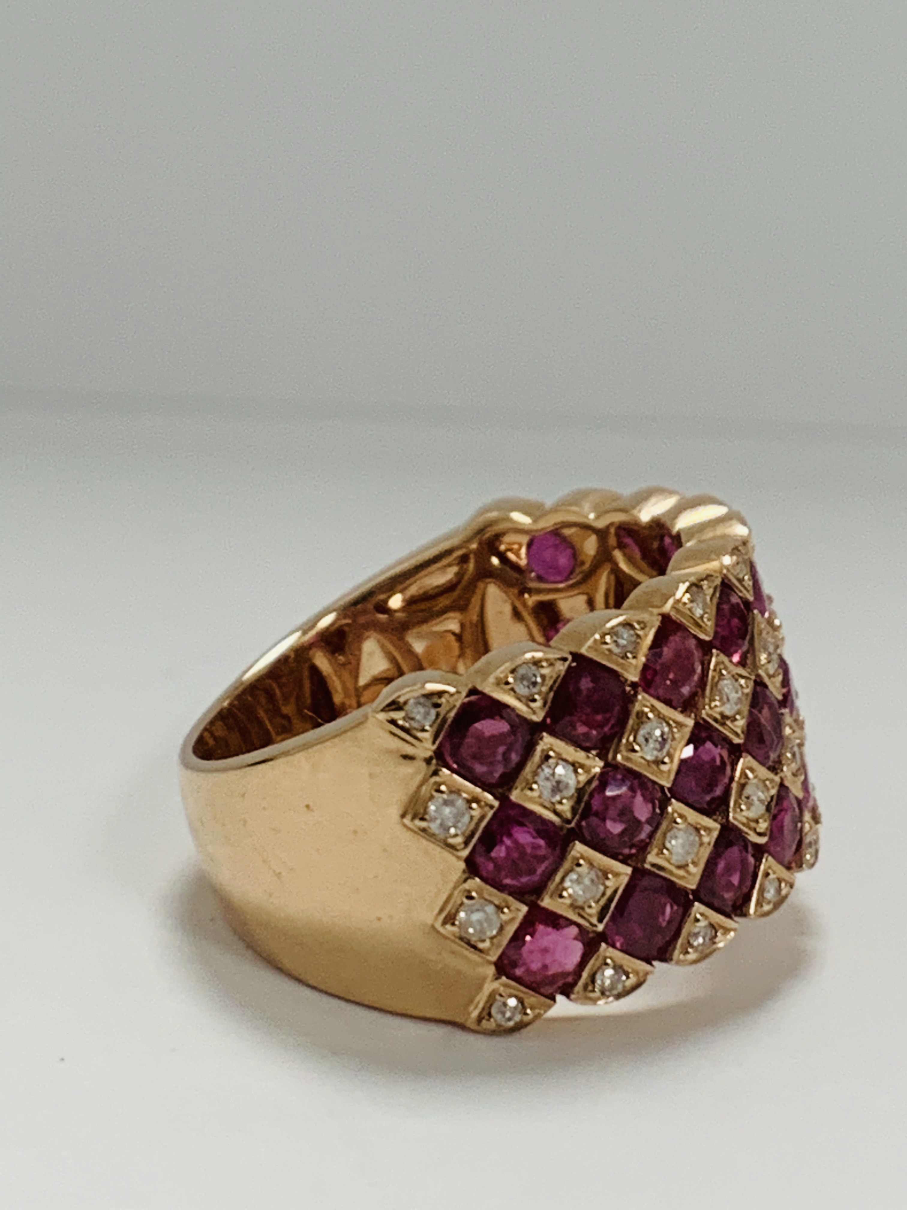 14ct Rose Gold Ruby and Diamond ring featuring, 27 round cut, medium pinkish red (2.81ct TSW), chann - Image 6 of 13