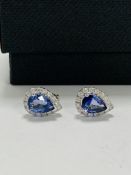14ct White Gold Sapphire and Diamond earrings featuring centre, 2 pear cut, medium blue Sapphire (1.