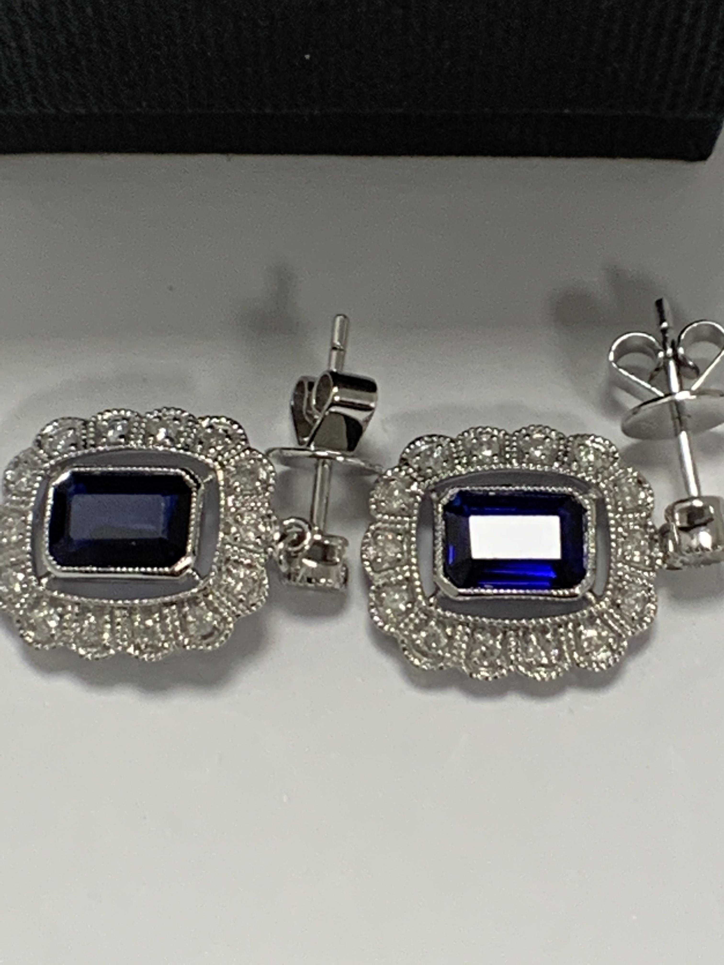 14ct White Gold Sapphire and Diamond earrings featuring, 2 cushion cut, blue Sapphires (2.24ct TSW), - Image 2 of 13
