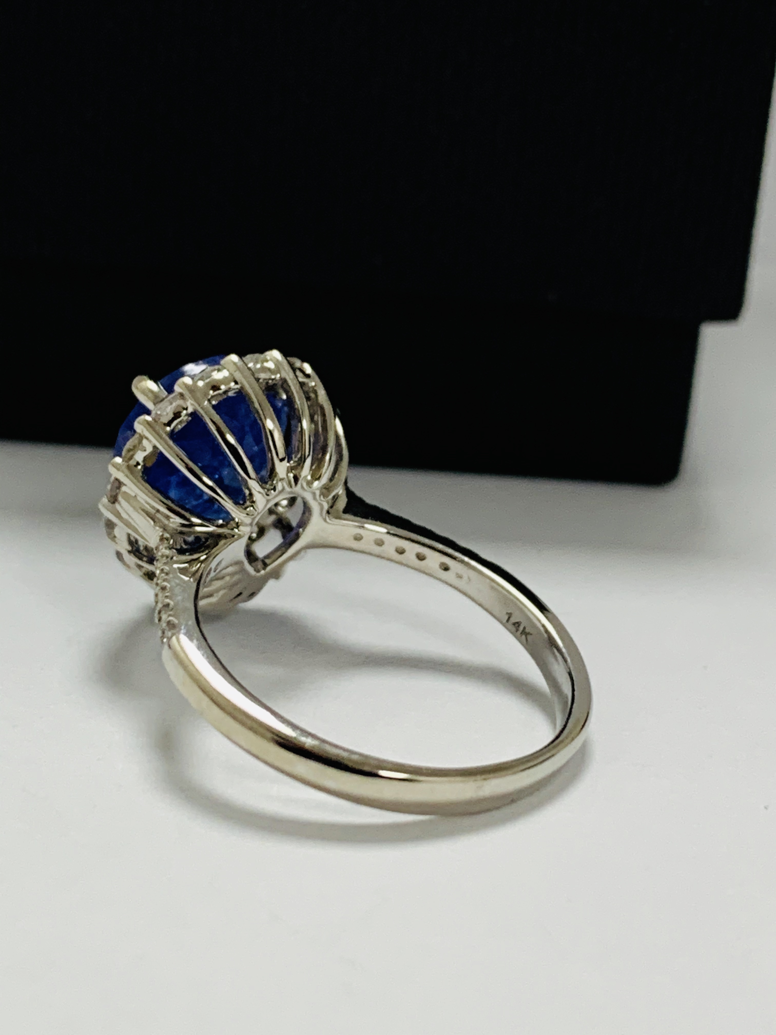 14ct White Gold Tanzanite and Diamond ring featuring, pear cut Tanzanite (4.17ct), claw set, with 28 - Image 4 of 13