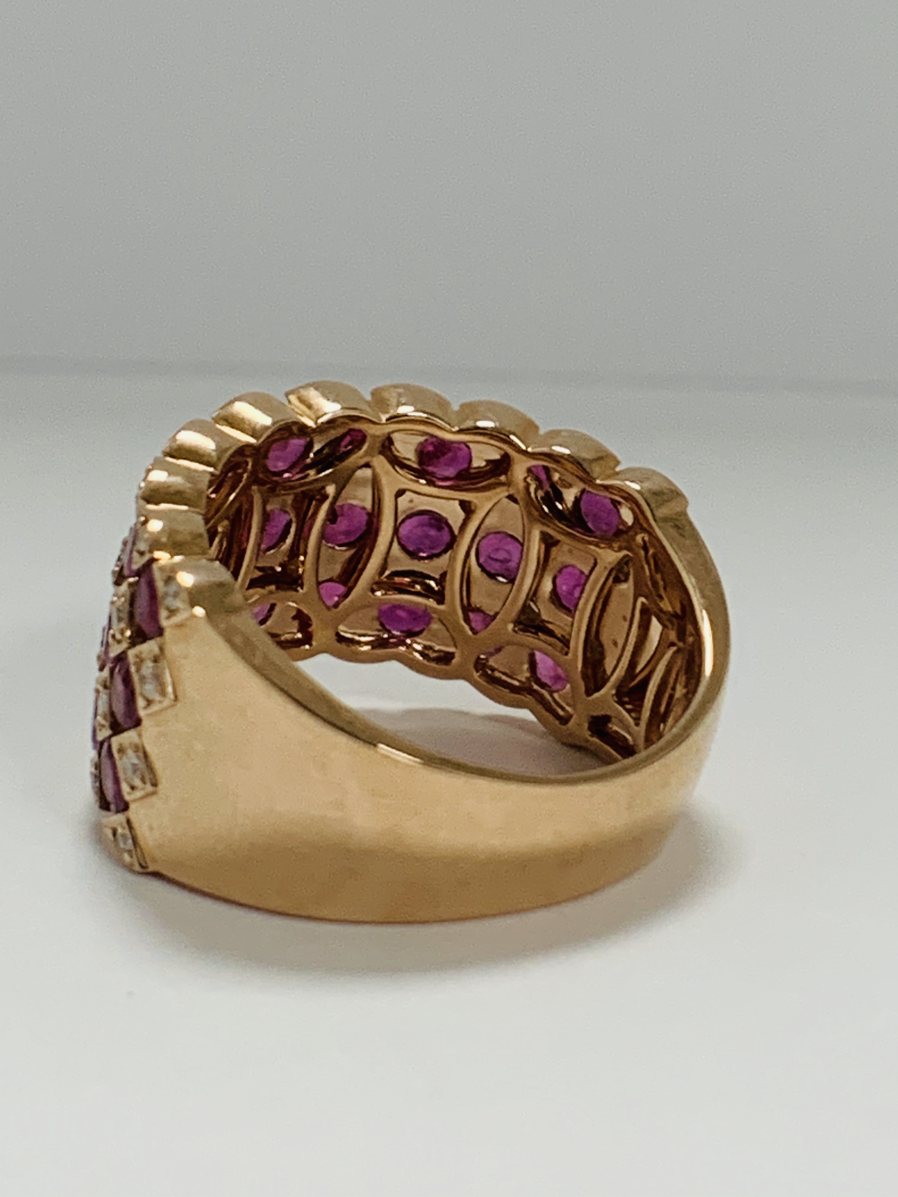 14ct Rose Gold Ruby and Diamond ring featuring, 27 round cut, medium pinkish red (2.81ct TSW), chann - Image 4 of 13