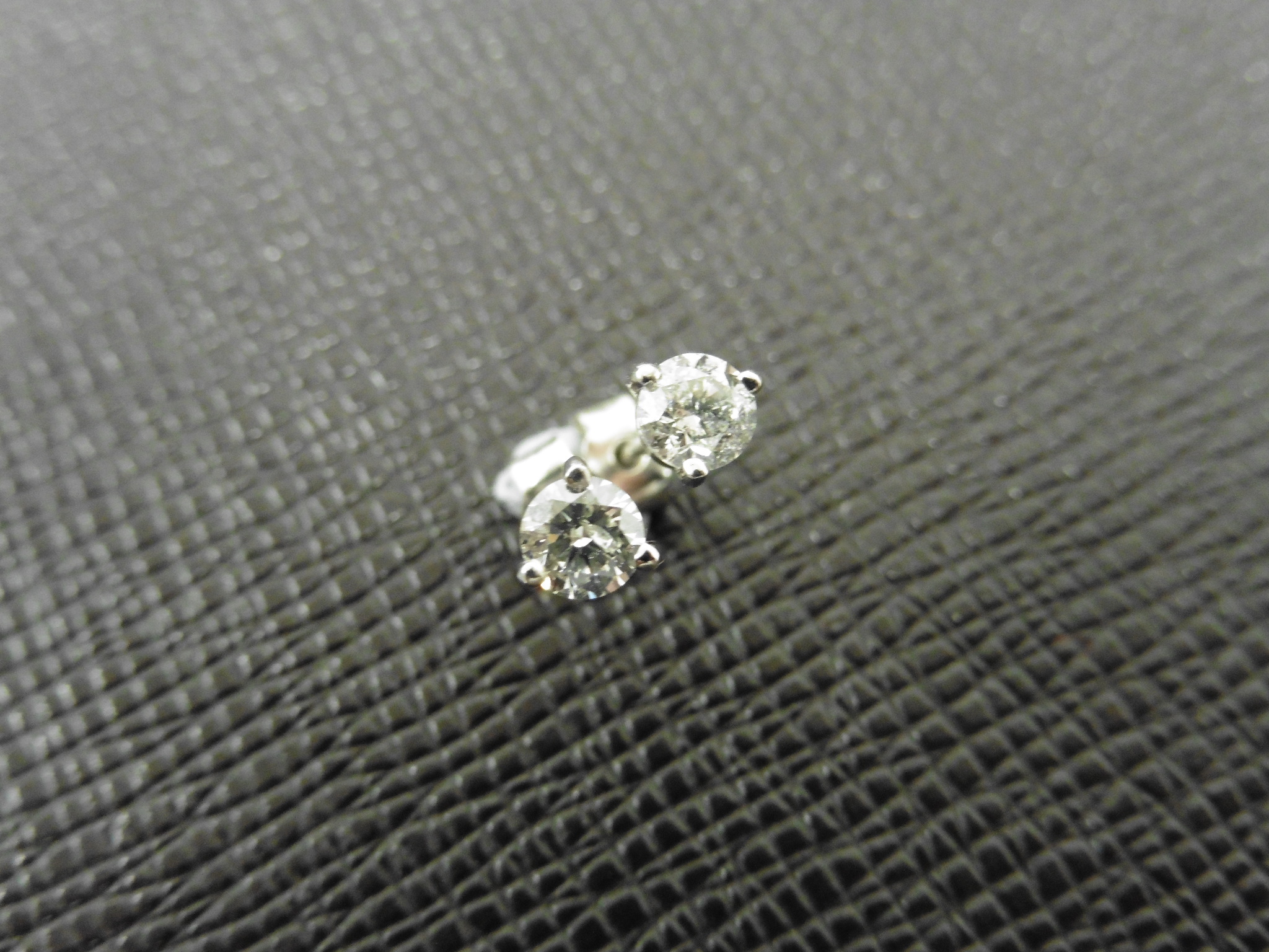 0.50Ct Diamond Solitaire Stud Earrings Set In Platinum.