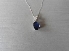 1Ct Sapphire And Diamond Pendant With An 7X5Mm Oval Cut Sapphire ( Fracture Treated ) And A Diamond