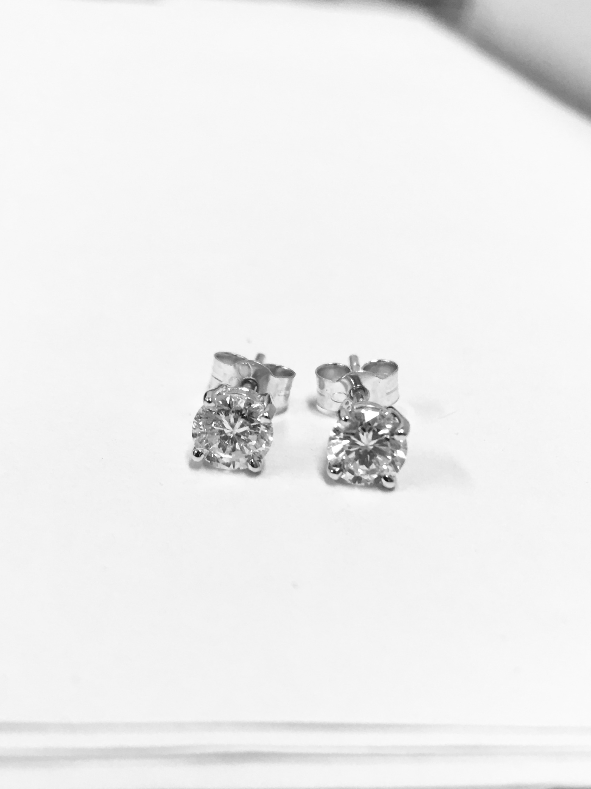 1.40Ct Diamond Solitaire Stud Earrings Set In Platinum.