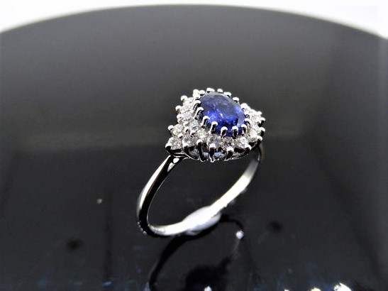 Sapphire And Diamond Cluster Style Ring Set In Platinum.