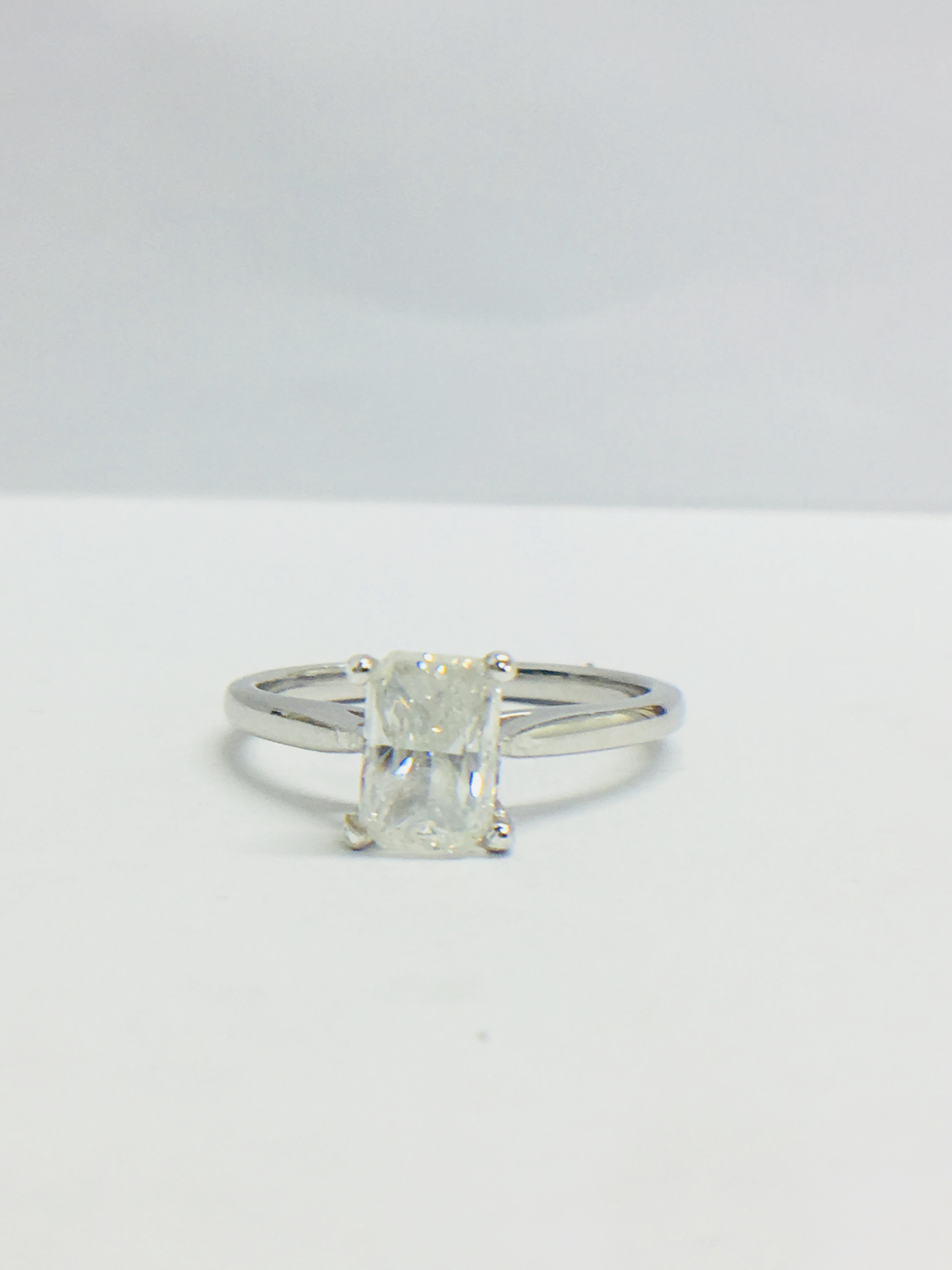 Platinum Oval Cut Diamond Solitaire Ring,