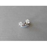 0.25Ct Diamond Solitaire Stud Earrings Set In Platinum.