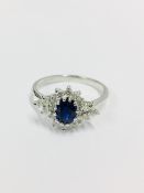 Sapphire And Diamond Cluster Style Ring Set In Platinum.