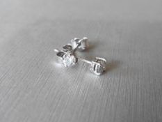 0.40Ct Diamond Solitaire Stud Earrings Set In Platinum.