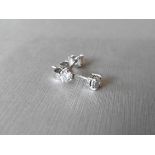 0.40Ct Diamond Solitaire Stud Earrings Set In Platinum.