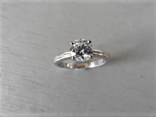 0.70Ct Diamond Solitaire Ring Set In Platinum.