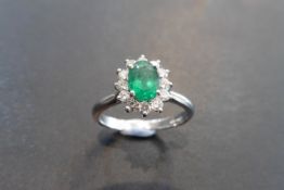 Platinum Emerald And Diamond Cluster Ring,