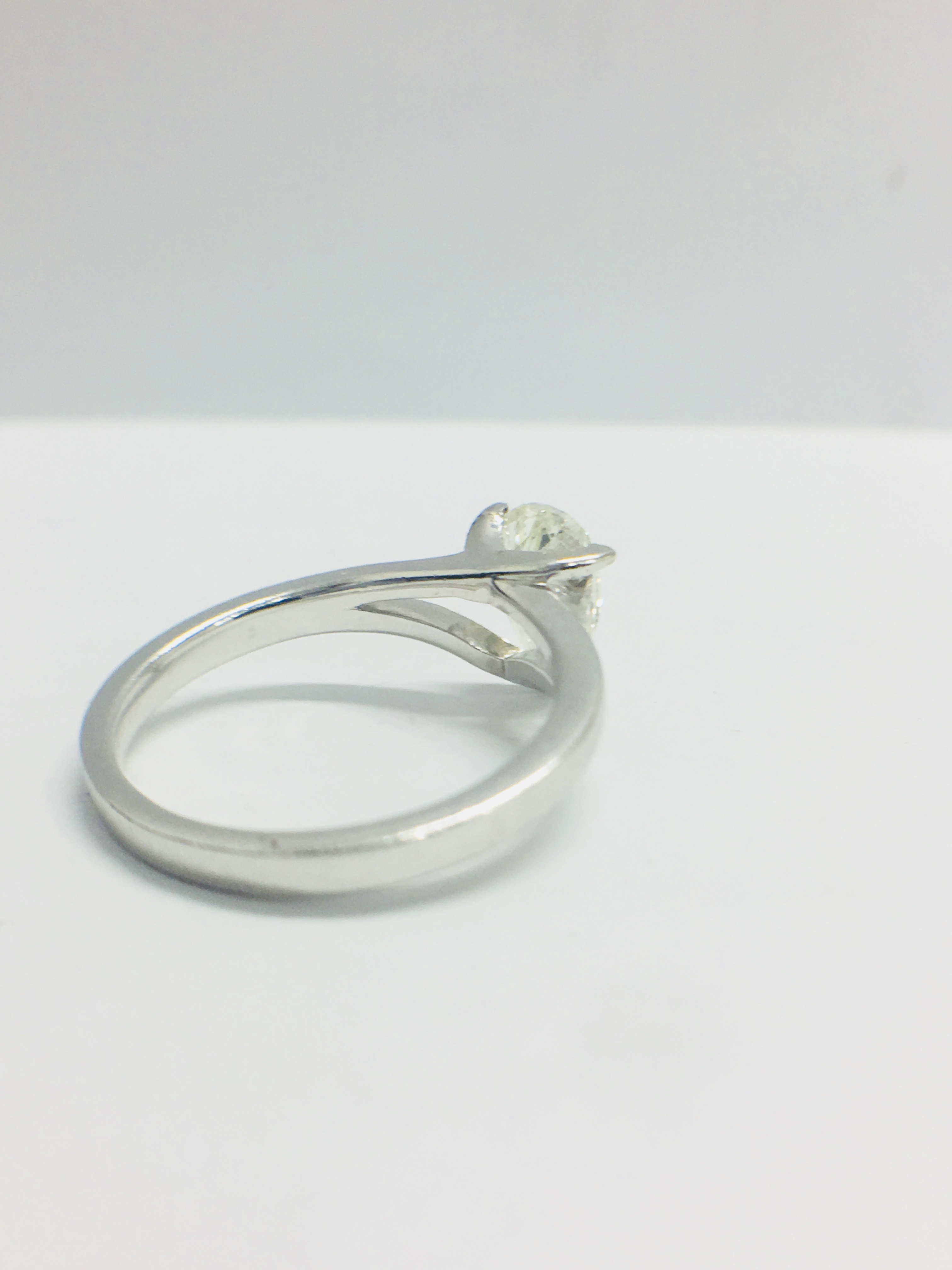 Platinum Diamond Solitaire Ring With A.