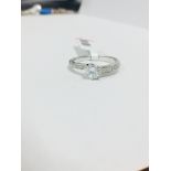 Platinum Diamond Solitaire Twist Design Ring,