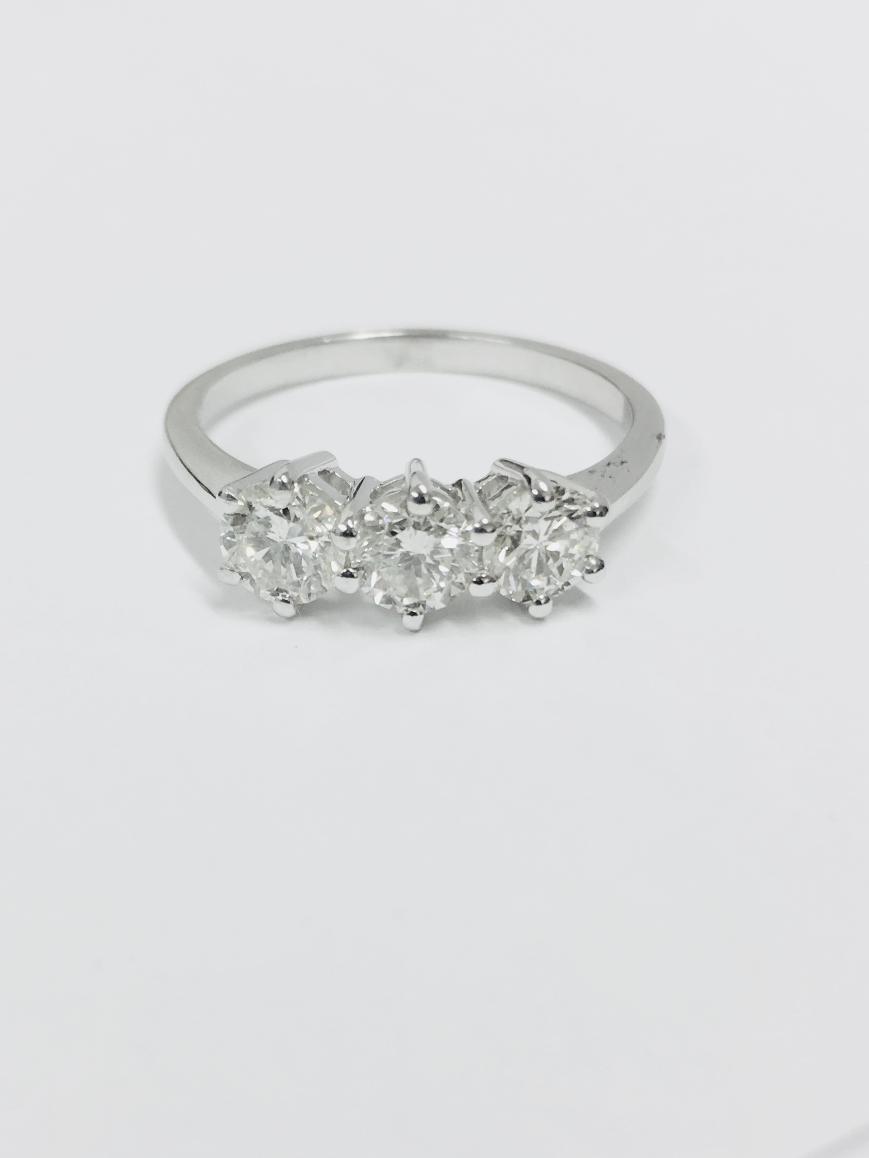 Platinum Diamond Three Stone Ring .