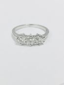 Platinum Diamond Three Stone Ring .