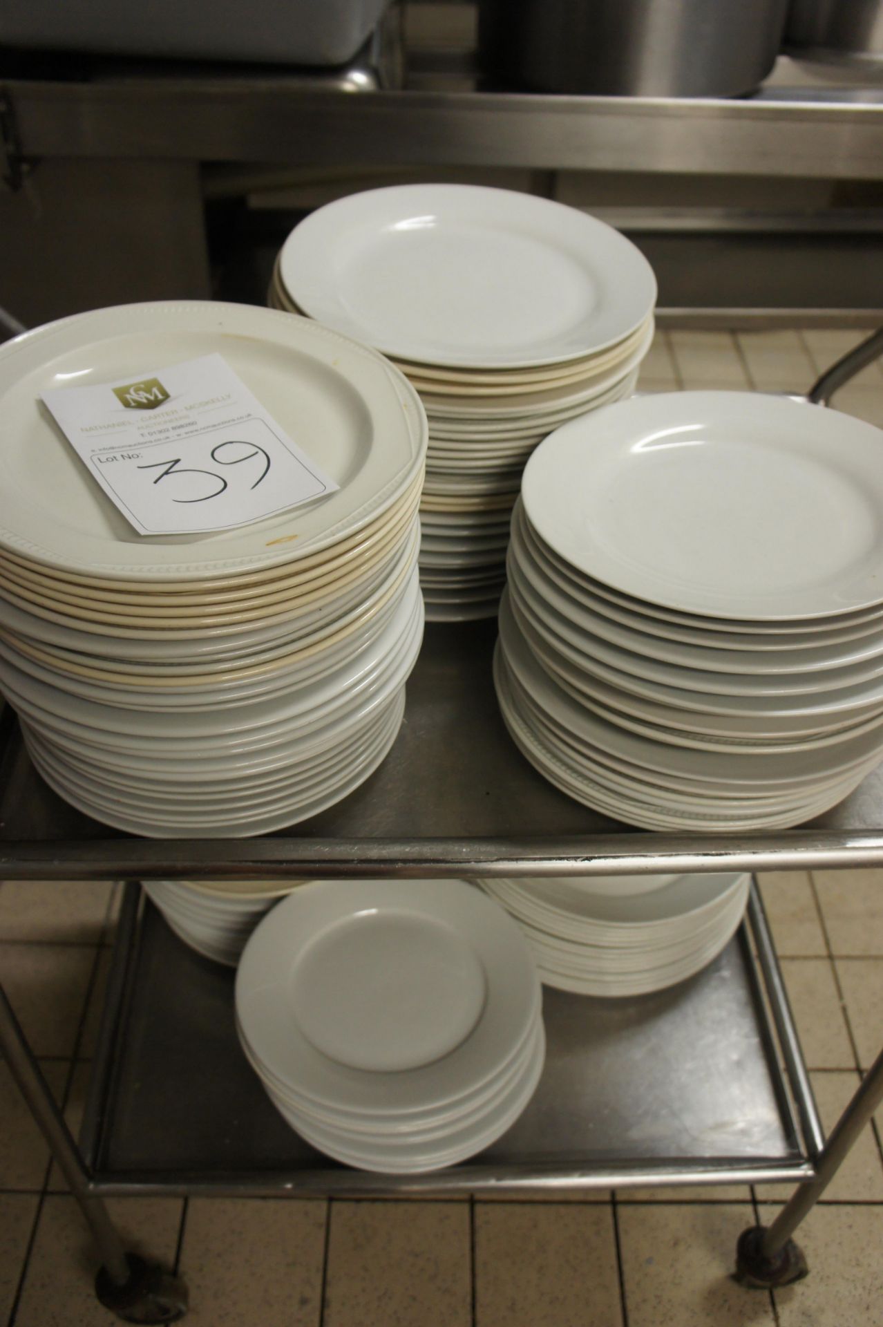 A mixed quantity of dining plates, as lotted