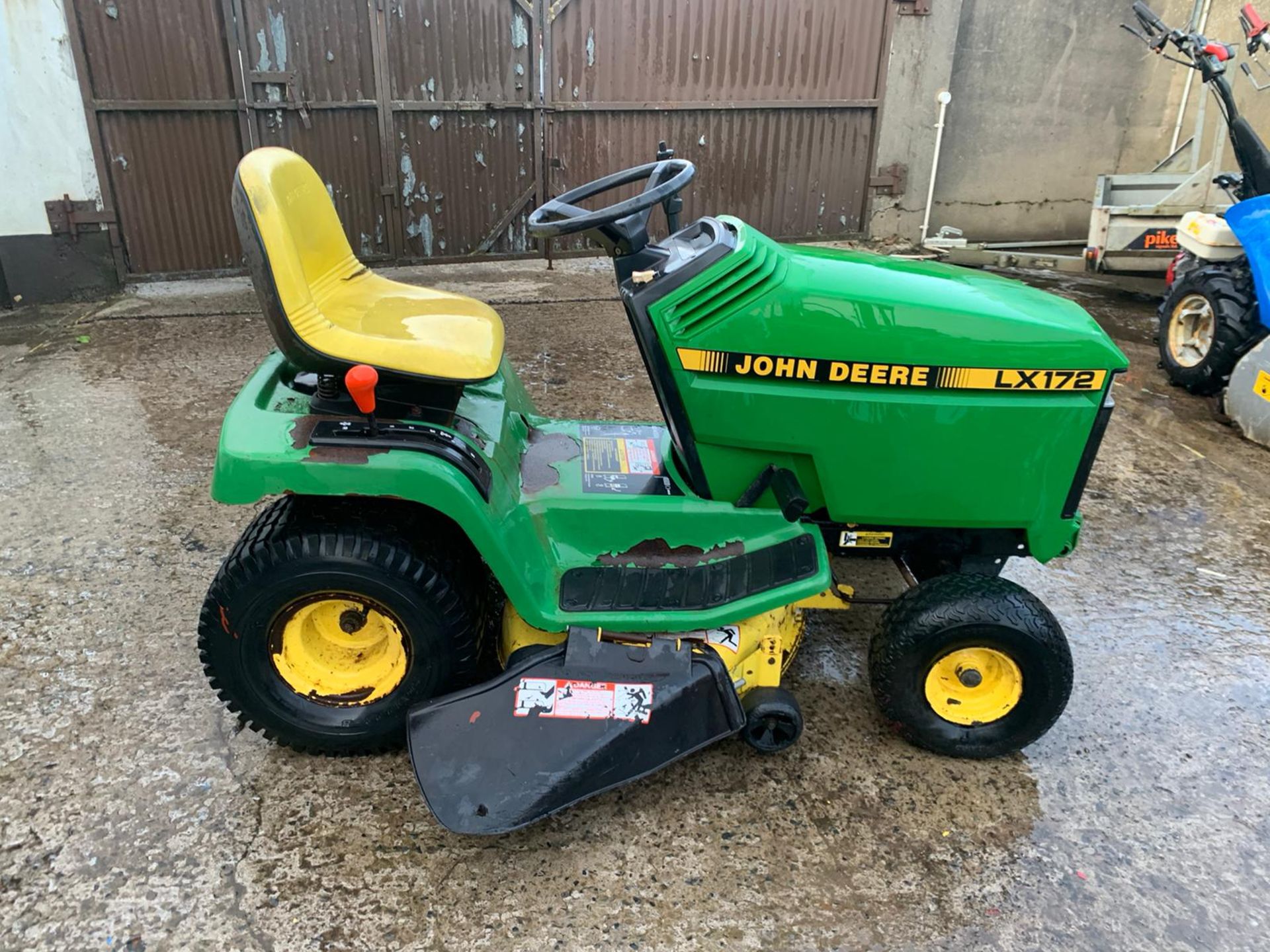 John Deere petrol ride on mower