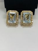 14ct Yellow Gold Aqumarine and Diamond stud earrings featuring, 2 emerald cut Aquamarines (13.00ct T