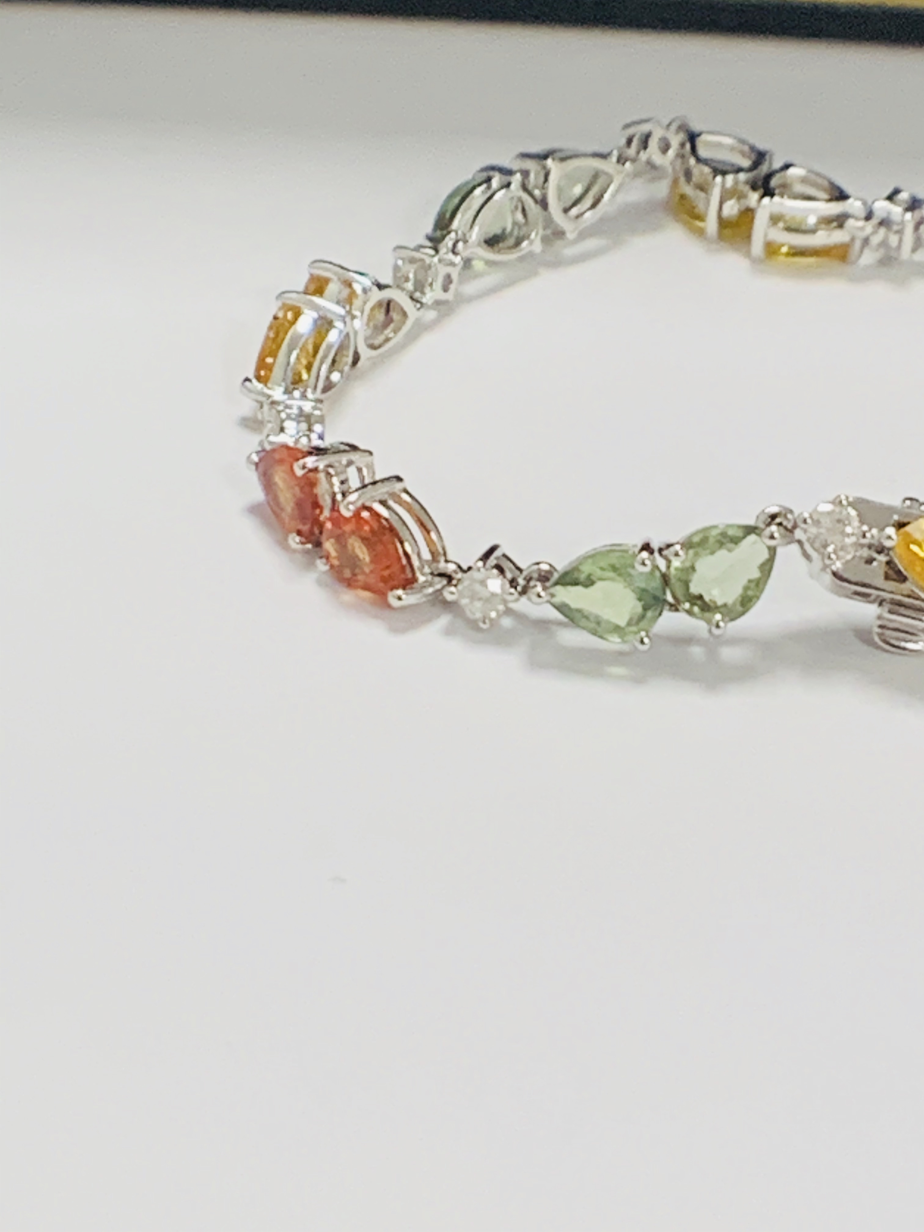 14ct White Gold Sapphire and Diamond bracelet featuring, 22 pear cut, yellow, green and orange Sapph - Image 19 of 24