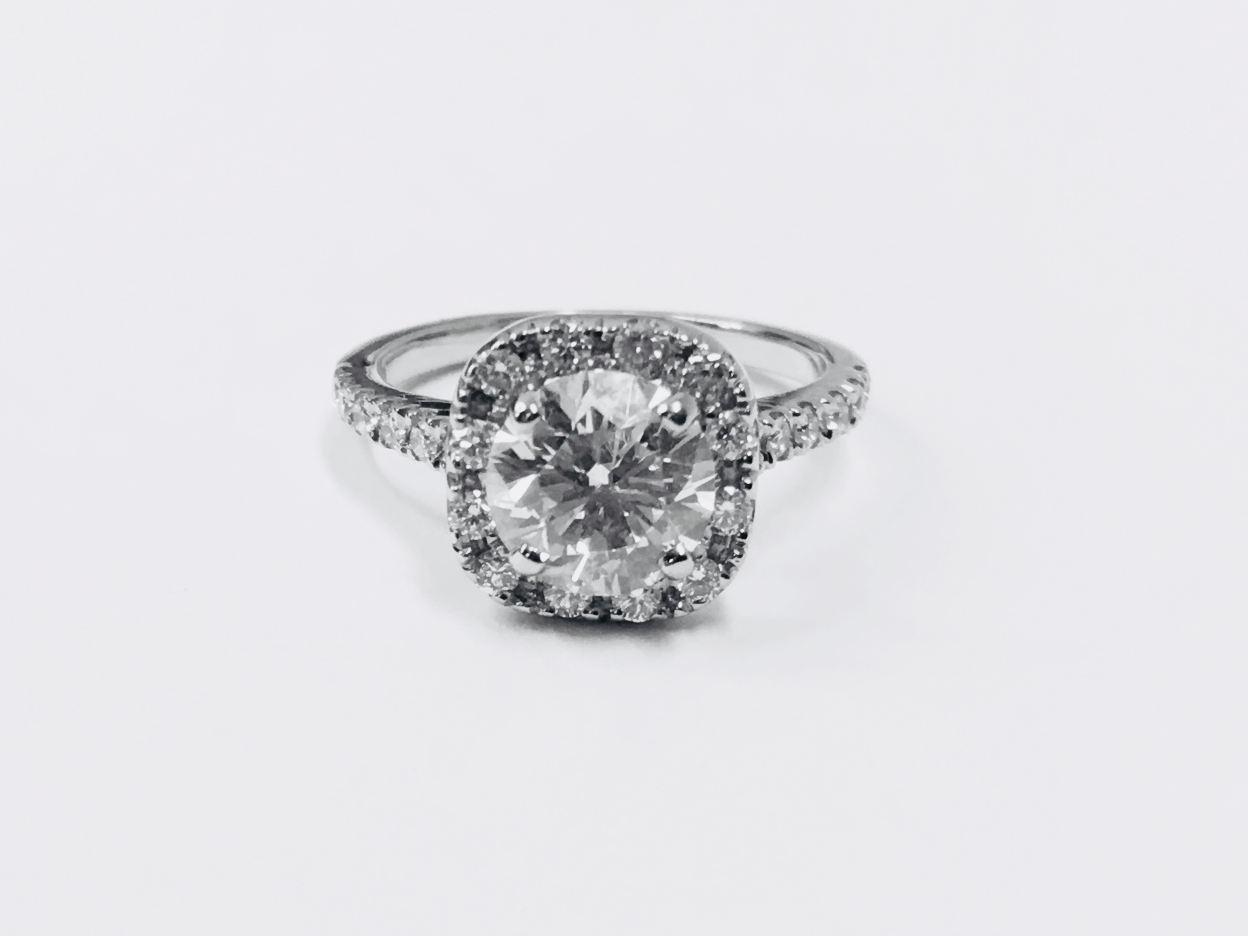 1.25ct diamond halo ring set in 18ct white gold - Image 11 of 24