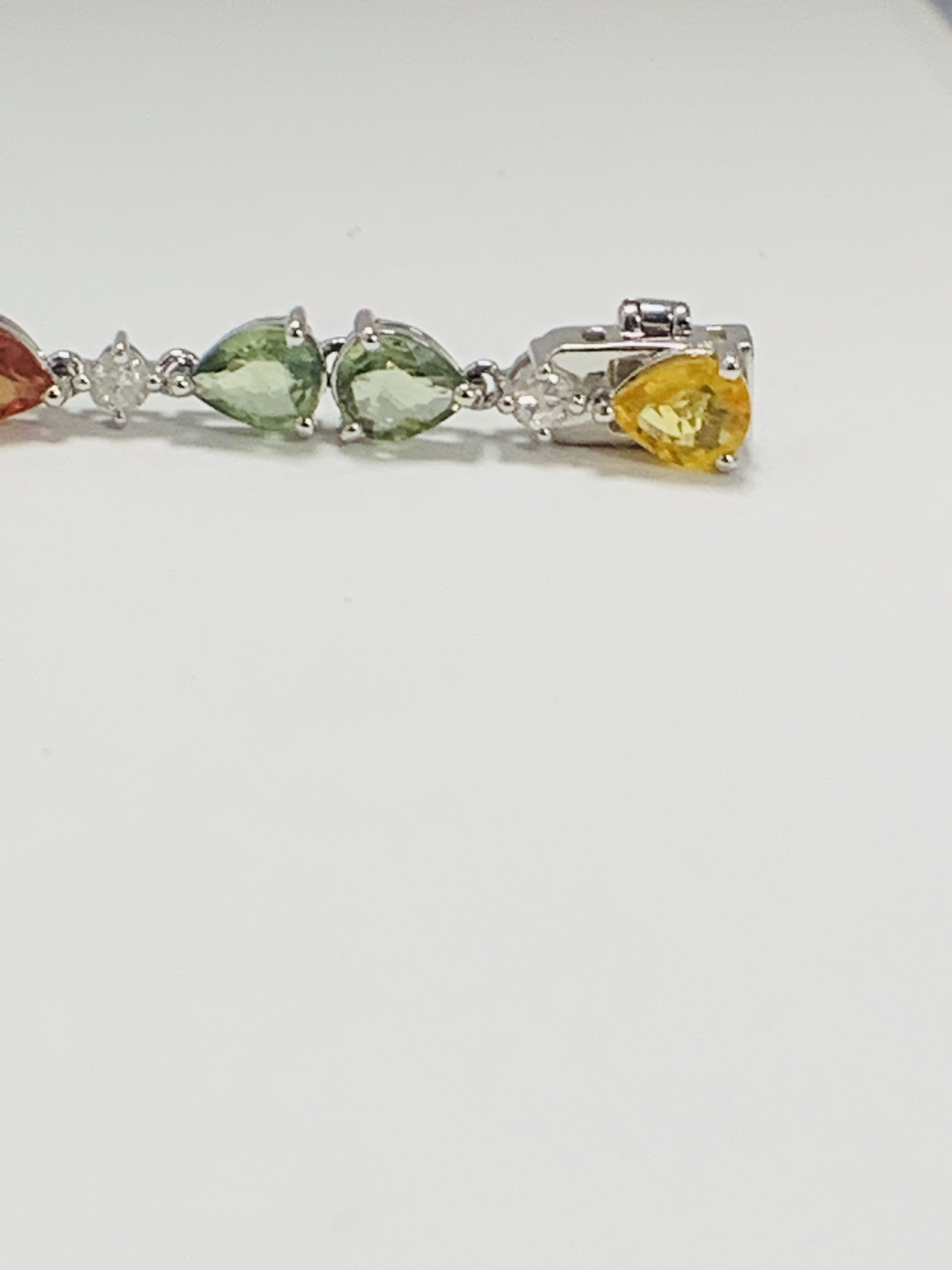 14ct White Gold Sapphire and Diamond bracelet featuring, 22 pear cut, yellow, green and orange Sapph - Image 9 of 24