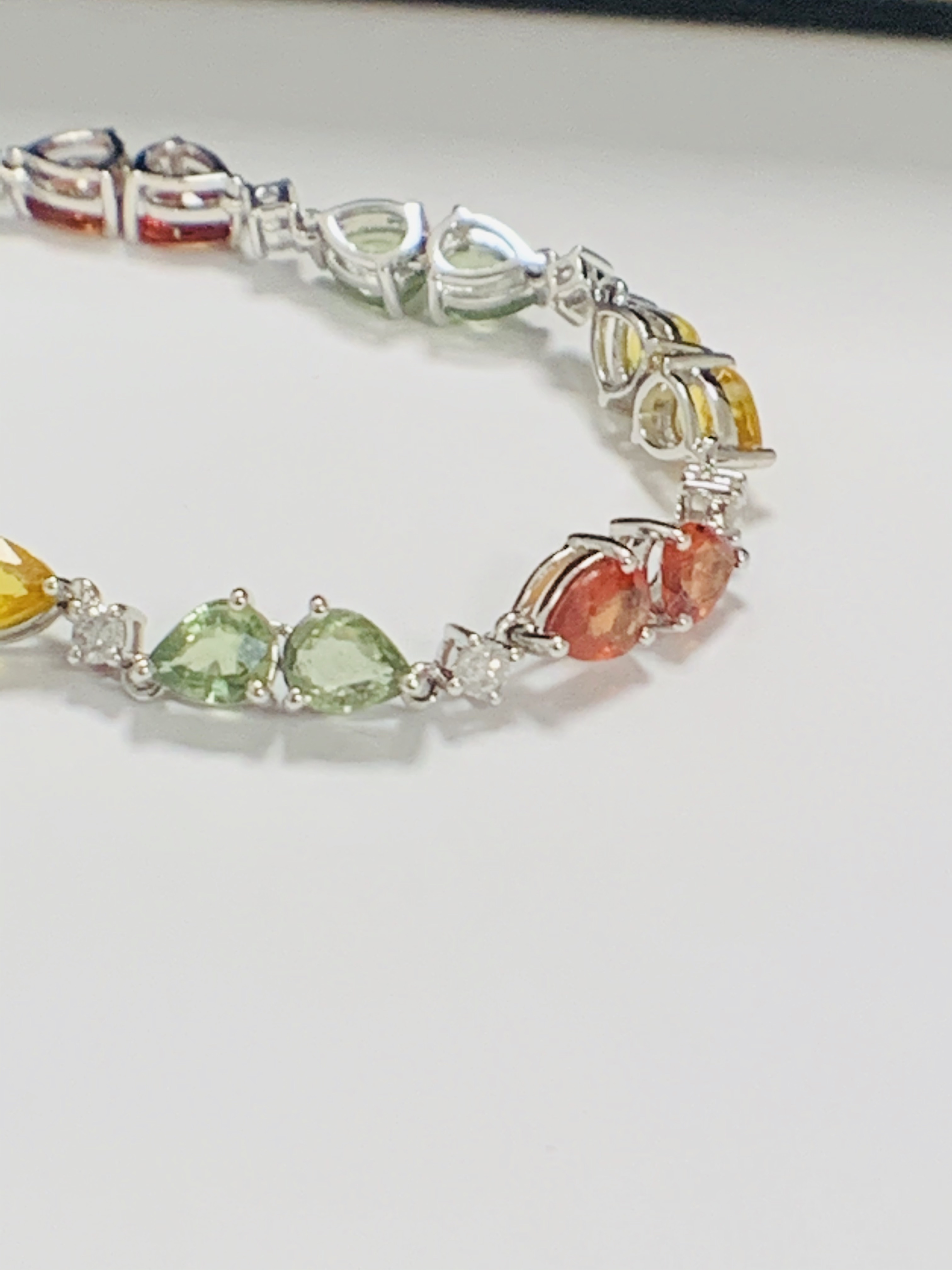 14ct White Gold Sapphire and Diamond bracelet featuring, 22 pear cut, yellow, green and orange Sapph - Image 20 of 24