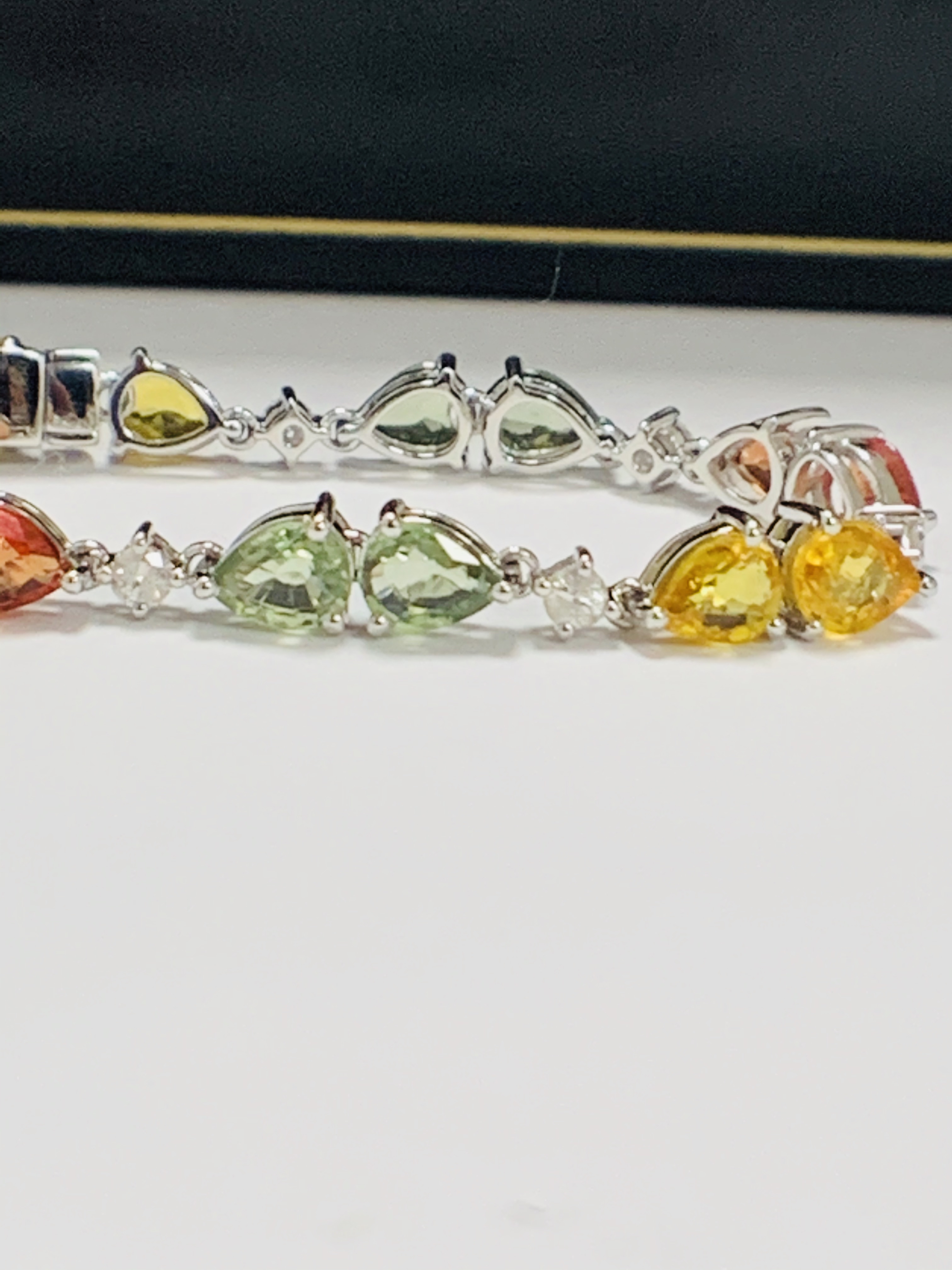 14ct White Gold Sapphire and Diamond bracelet featuring, 22 pear cut, yellow, green and orange Sapph - Image 17 of 24