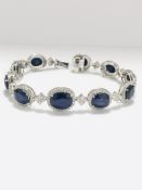 18ct White Gold Sapphire and Diamond bracelet featuring, 10 oval cut, dark blue Kashmir Sapphires (2