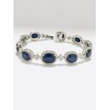 18ct White Gold Sapphire and Diamond bracelet featuring, 10 oval cut, dark blue Kashmir Sapphires (2