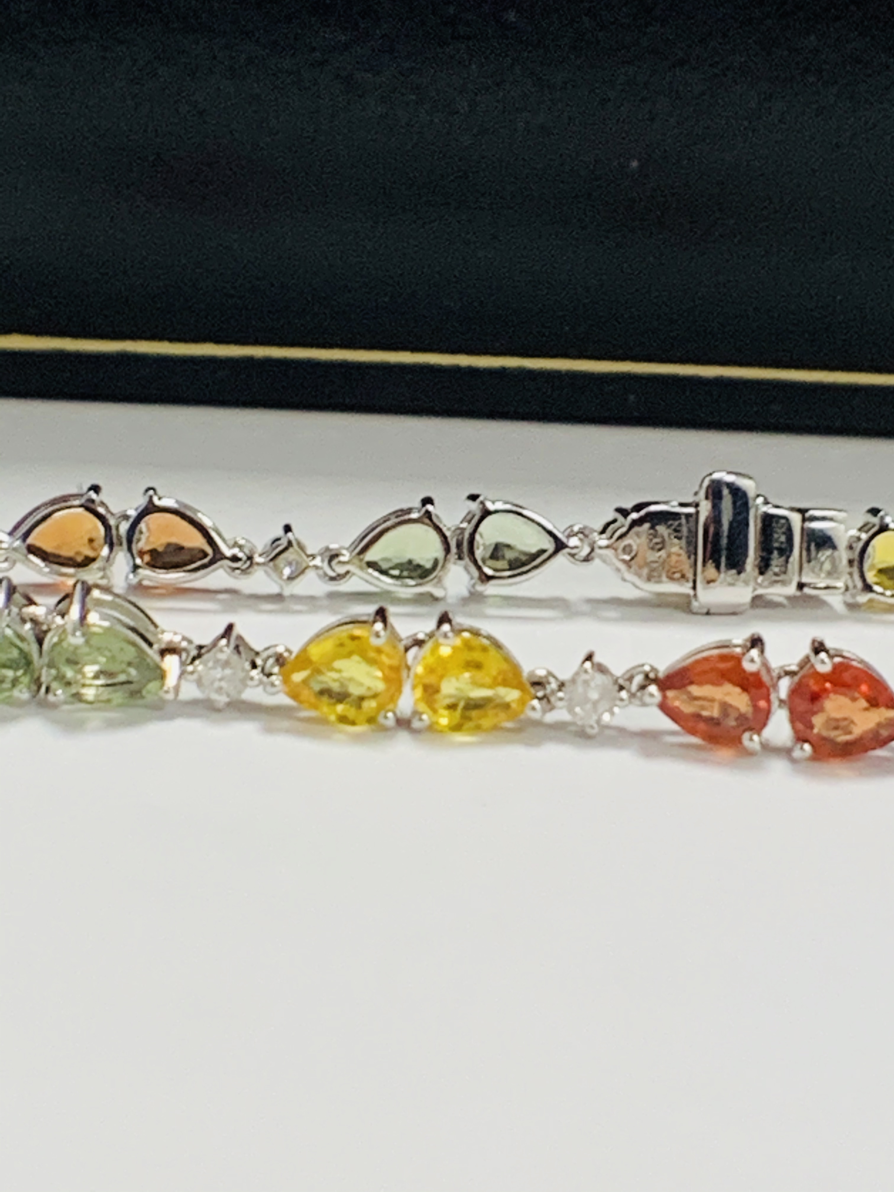 14ct White Gold Sapphire and Diamond bracelet featuring, 22 pear cut, yellow, green and orange Sapph - Image 14 of 24