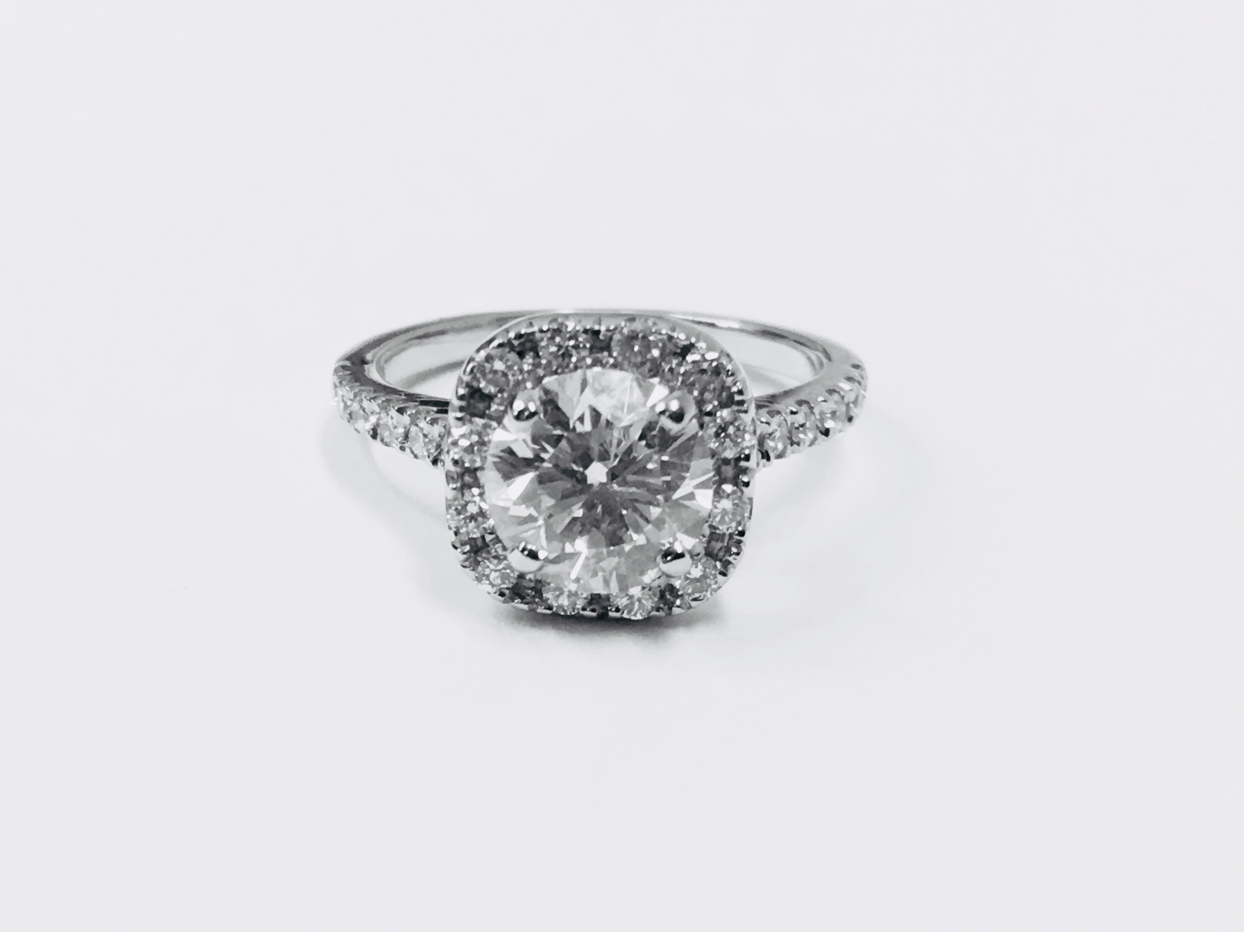 1.25ct diamond halo ring set in 18ct white gold - Image 13 of 24